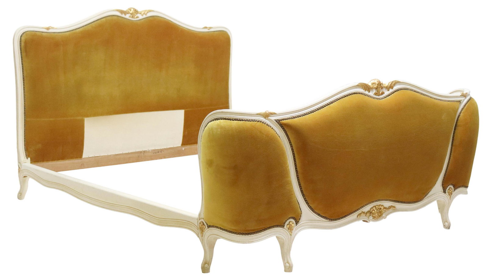 FRENCH LOUIS XV STYLE PAINTED & PARCEL GILT BED: French Louis XV style painted and parcel gilt bed, 20th c., having shaped frame, with parcel gilt foliate crest, in a yellow upholstery, with nailhead trim, rising on cabriole legs, ending on whorl fe