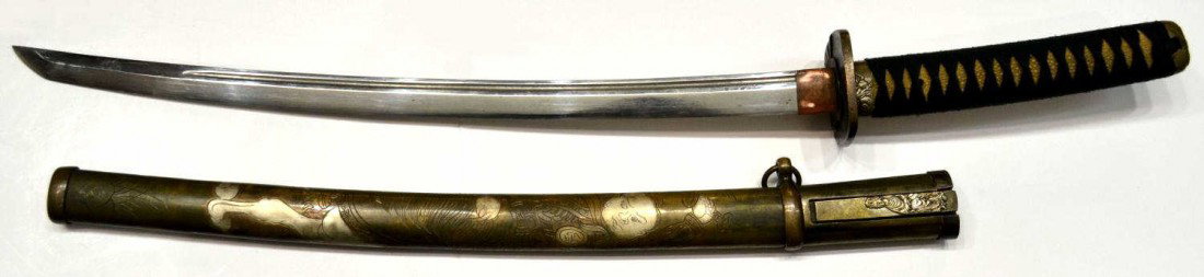 JAPANESE SAMURAI SWORD & SCABBARD WITH KNIVES: Japanese Samurai sword, the 20.5/8" steel layered hamon pattern blade having an upper fuller, guard with figural decoration, wrapped shagreen grip with decorative cap, the scabbard with figural engrav