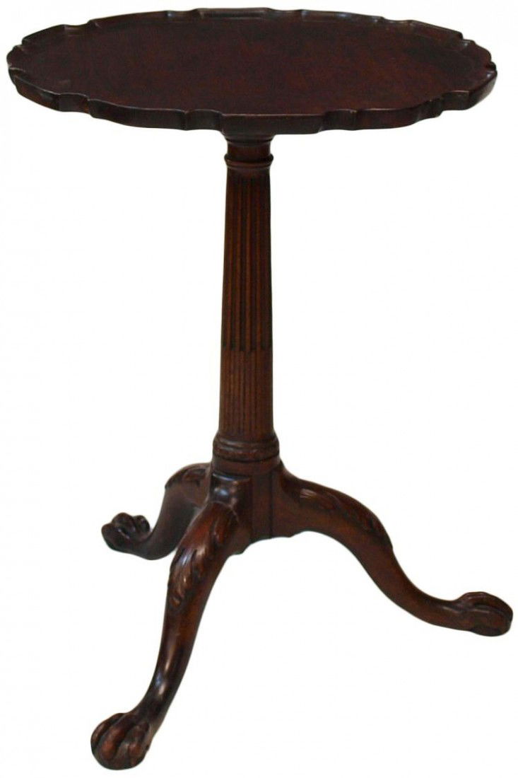 VICTORIAN TILT TOP TABLE: British Victorian mahogany tilt top table, a shaped edge 22"d top tilting on a well formed tripod base with ball and claw feet, staining, top tilted: 39"h, top down: 27.75"h, 22.5"w, 22.5"d Start Pric