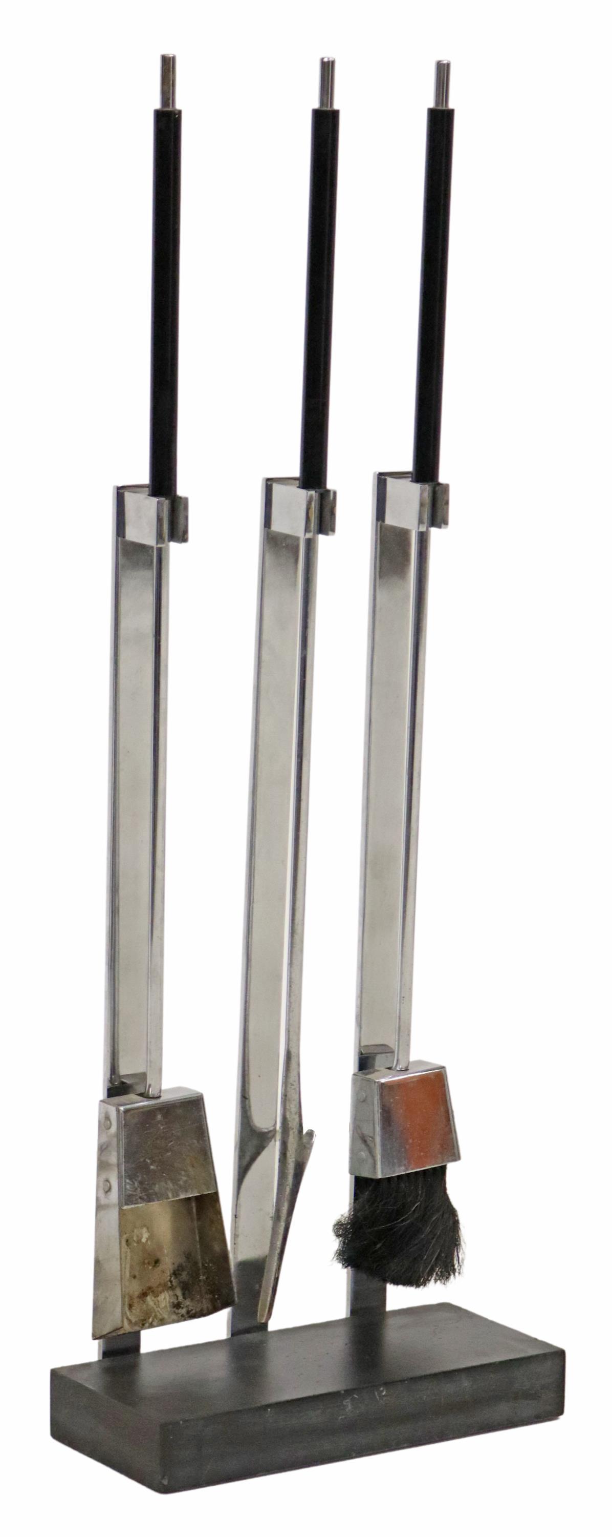ALESSANDRO ALBRIZZI (D.1994) FIREPLACE SET & STAND: Modern chromed steel fireplace tools and stand, attributed to Alessandro Albrizzi (Italian, 1934-1994), c.1970s, including a fire poker, shovel, and brush, wear and pitting to metal, approx 36.5"h, 13