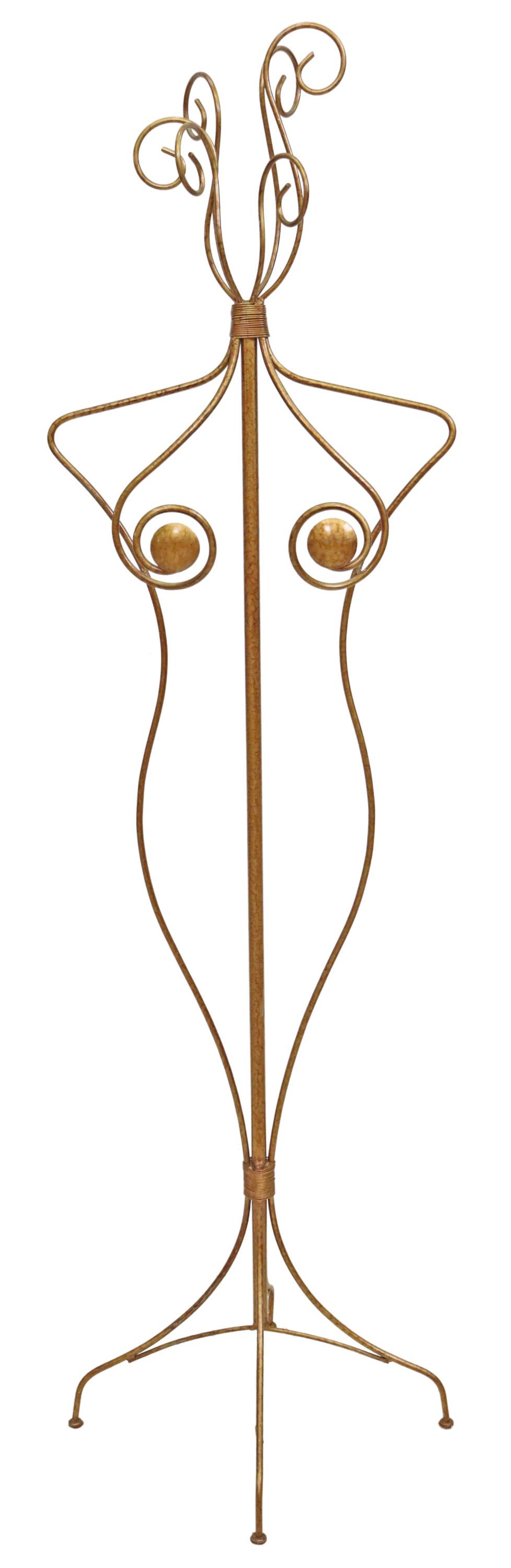 ITALIAN MID-CENTURY MODERN FIGURAL HALL TREE: Italian mid-century modern figural hall tree, c.1950s, having six top hooks, over open metal female form, rising on quadripartite base, approx 73"h, 21.5"sq Start Price: $150.00