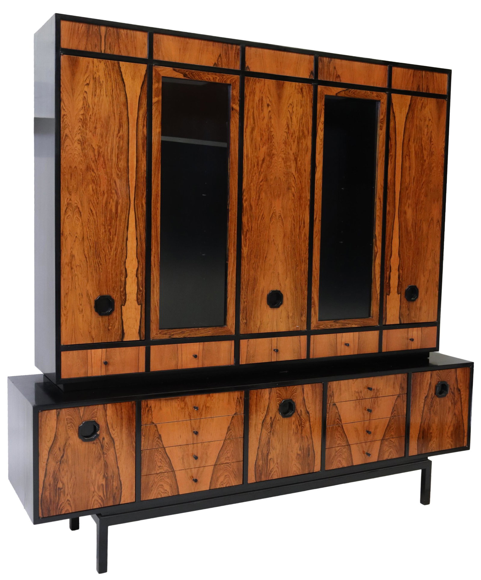 MANNER OF HARVEY PROBBER ROSEWOOD 2-PART CABINET: Mid-century modern rosewood and ebonized two-part sideboard/ media cabinet, in the manner of Harvey Probber, c.1960s, top case fitted with four cabinets, two having glazed doors and interior lighting 