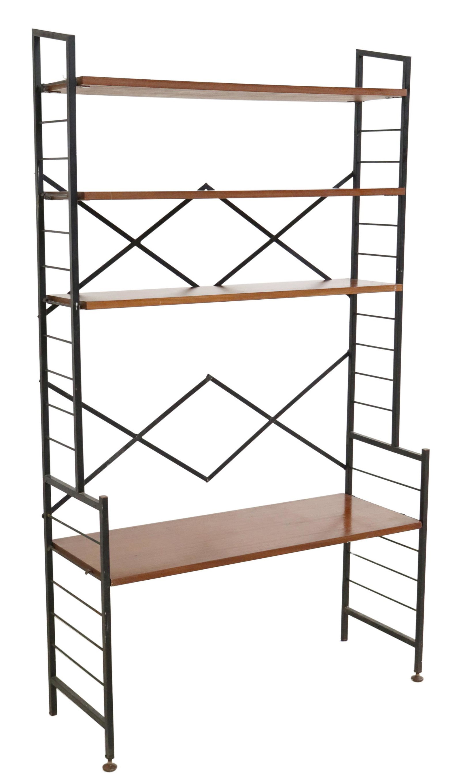 ITALIAN MID-CENTURY MODERN TEAK & STEEL BOOKCASE: Italian mid-century modern teak bookcase, c.1960s, having three top shelves, over lower protruding shelf, rising on black ladder-form steel supports, ending on brass capped feet, approx 58"h, 33"w, 12