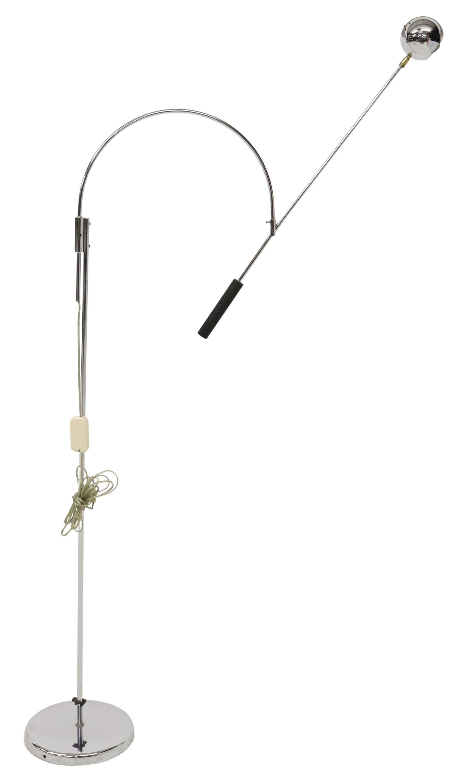 ROBERT SONNEMAN (B.1943) ORBITER CHROME FLOOR LAMP: Mid-century modern "Orbiter" floor lamp, attributed to Robert Sonneman (American, b.1943), c.1970s, adjustable arm, ending in domed shade concealing a single light, rising on a weighted base,in need o