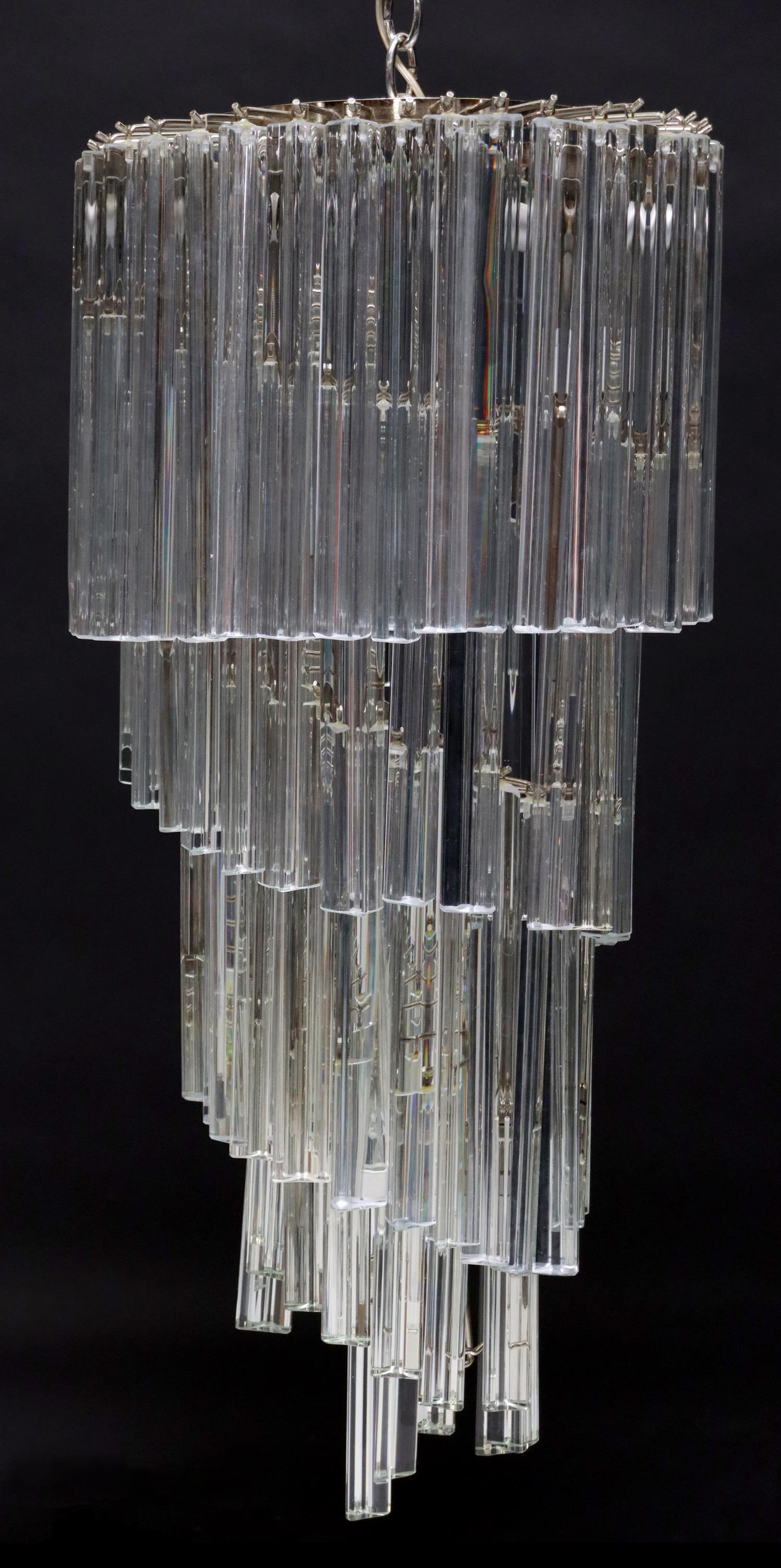 ITALIAN MURANO GLASS WATERFALL SPIRAL CHANDELIER: Italian Murano art glass eight-light chandelier, attributed to Camer Glass, c.1960s-1970s, chromed steel frame, cascading colorless glass prisms, some mismatched prisms, in need of wiring, approx 36"h