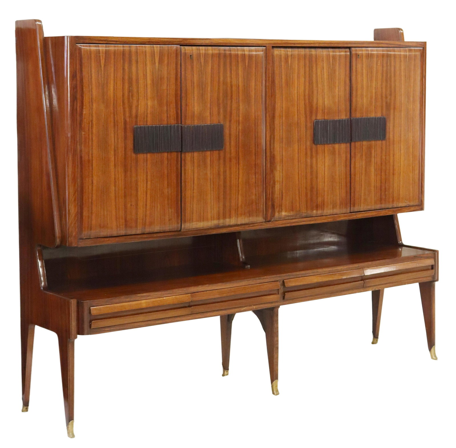 ITALIAN BORSANI STYLE MID-CENTURY MODERN SIDEBOARD: Italian mid-century modern sideboard, in the manner of Osvaldo Borsani (Italian, 1911-1985), c.1950s, two sets of double-door cabinets with reeded panels, over four drawers, rising on tapered legs, en