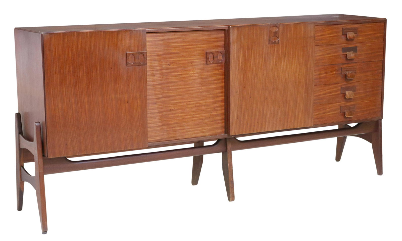 ITALIAN MID-CENTURY MODERN TEAK SIDEBOARD: Italian mid-century modern teak sideboard, c.1950s, central drop-front cabinet, flanked by five drawers to the right, and sliding door cabinet to the left, rising on base with tapered legs, restoratio