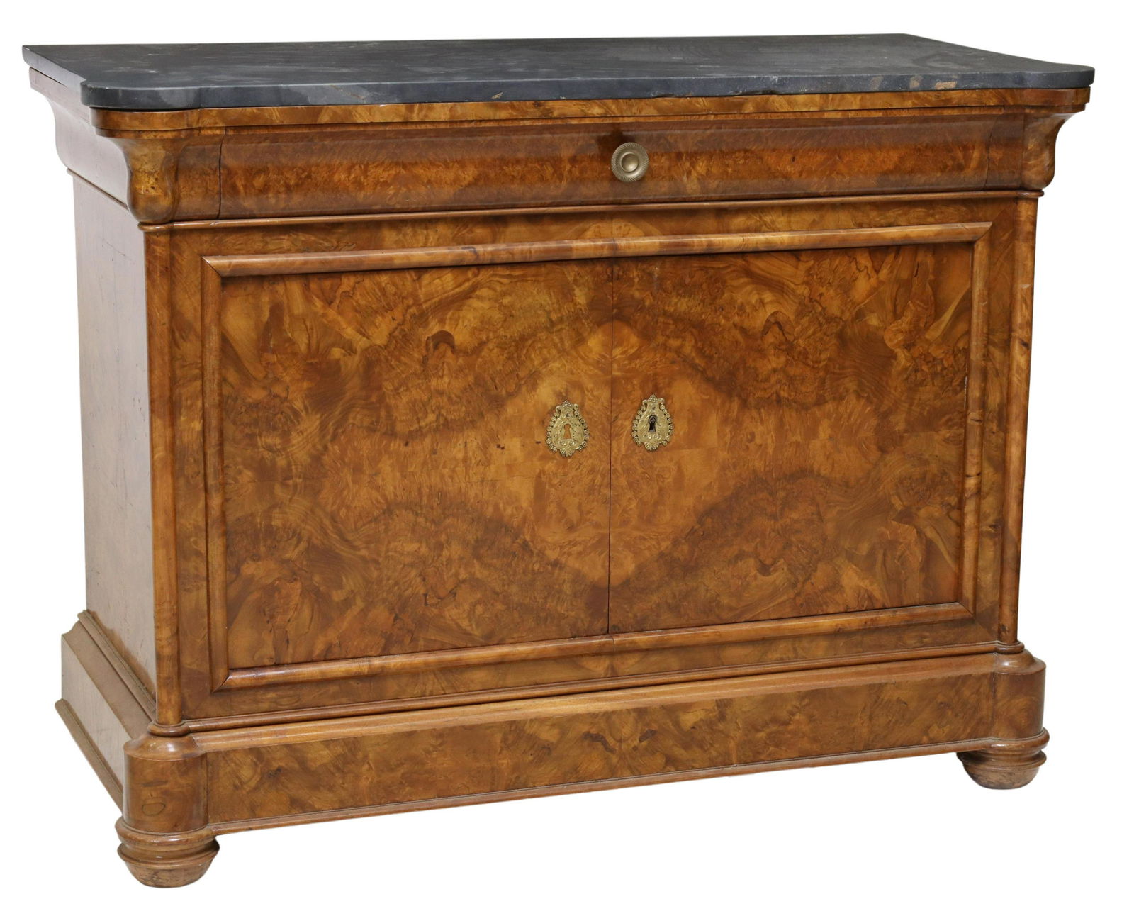 FRENCH LOUIS PHILIPPE MARBLE-TOP BURLWOOD COMMODE: French Louis Philippe period marble-top commode, mid 19th c., ogee frieze drawer, double-door cabinet opening to three tray drawers, approx 39"h, 52.25"w, 24.5"d Start Price: $600.00