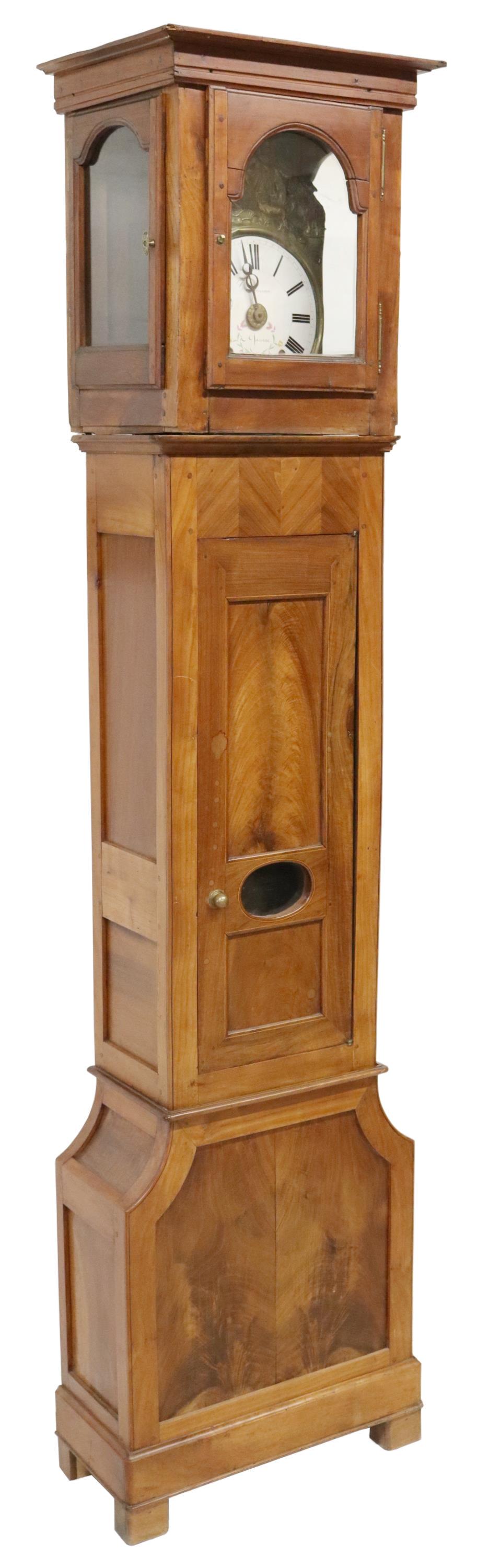 LOUIS PHILIPPE PERIOD ASSEMBLED LONGCASE CLOCK: French Louis Philippe period assembled mixed wood longcase clock, mid-19th c., later bonnet with glazed viewing panels, over shaped case, gilt-metal repousse figural frame, encasing enamel dial painte