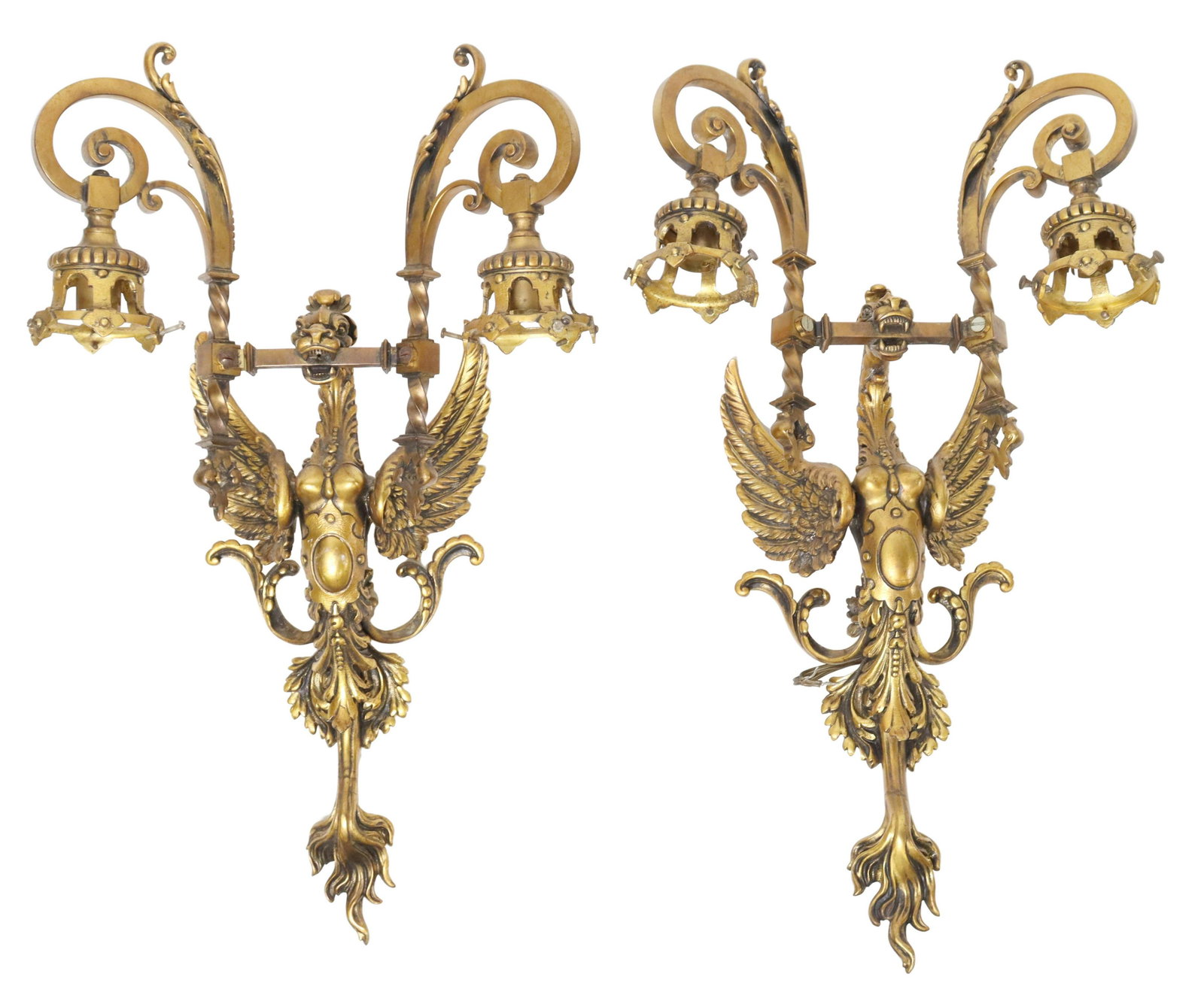 (2) FRENCH EMPIRE STYLE GILT METAL GRIFFIN SCONCES: (pair) French Empire style gilt metal two-light wall sconces, early 20th c., having figural winged griffin-form wall mount, issuing two scrolled arms, each ending on pierced bobeches and single light,