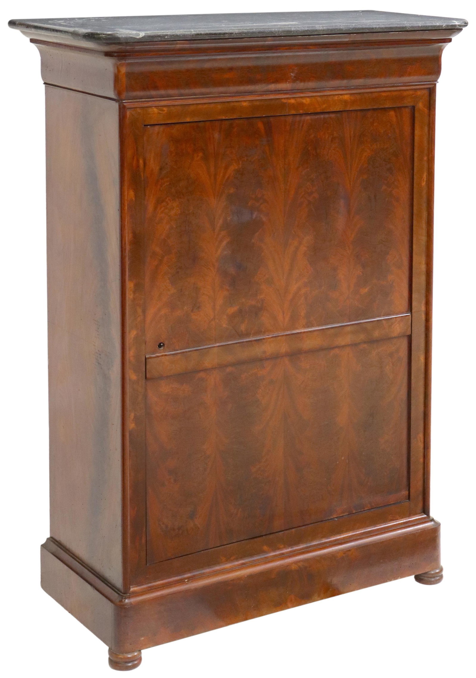 FRENCH LOUIS PHILIPPE MARBLE-TOP MAHOGANY CABINET: French Louis Philippe period flame mahogany cabinet, mid-19th c., having marble top, over single cabinet door, opening to shelved interior, rising on turned legs, approx 56 7/8"h, 40"w, 18"d Start Pri
