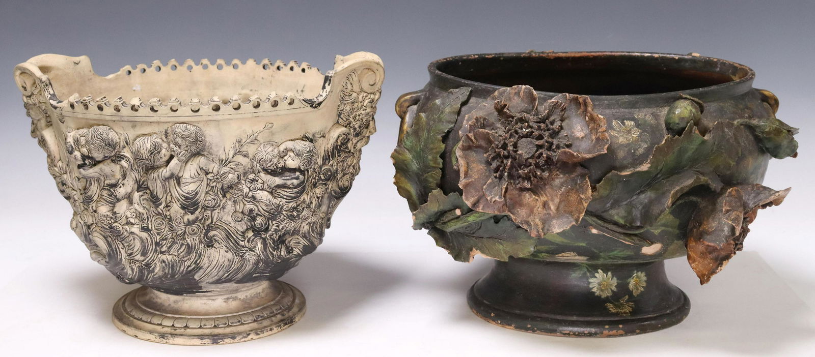 2) EARTHENWARE JARDINIERES, GERBING & STEPHAN: (lot of 2) Painted earthenware planters, including: (1) Gerbing and Stephan, having pierced and scalloped rim, dual mask handles at sides, with allegorical figures in relief, maker's mark underfoot, a