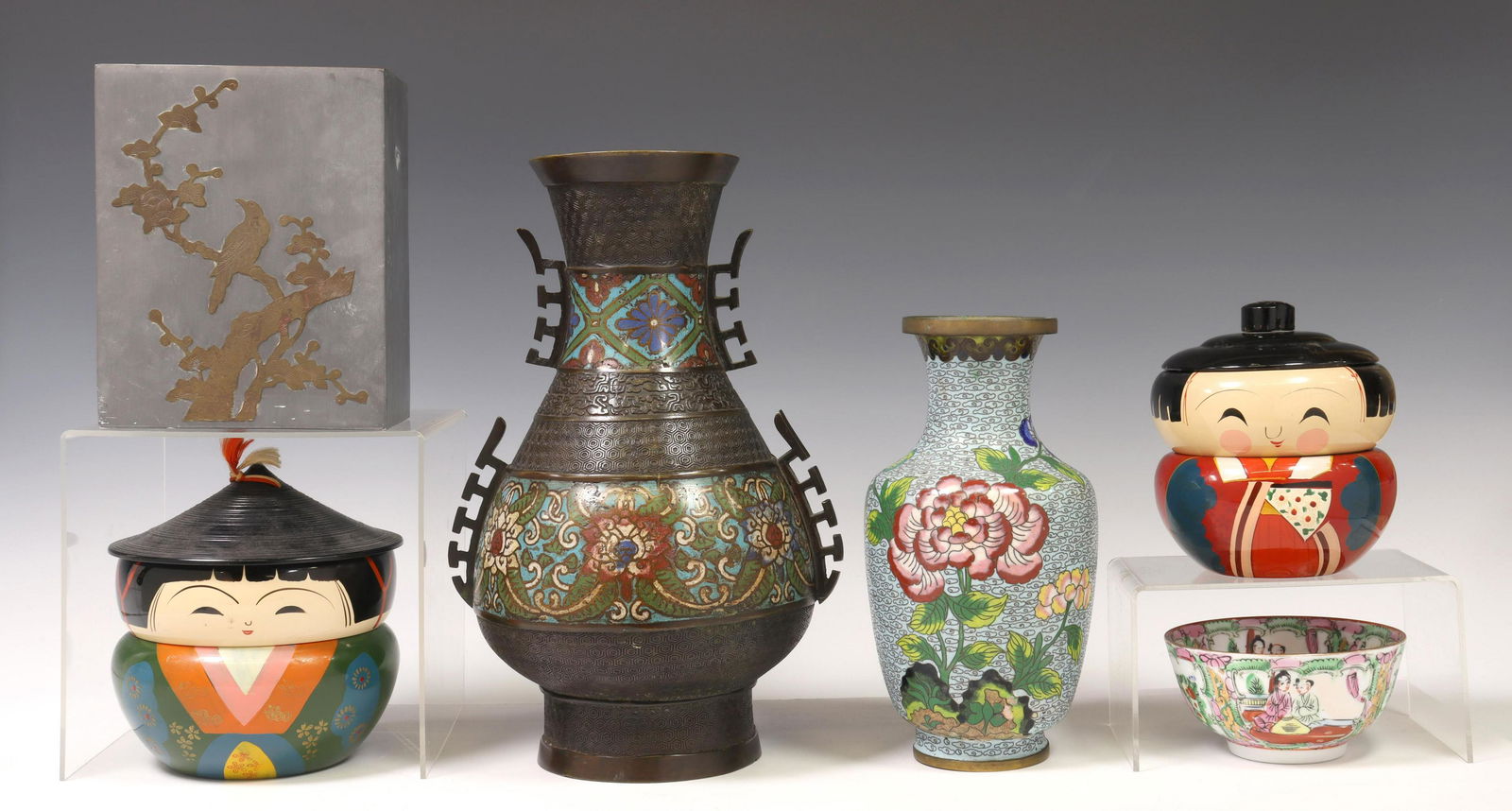 (6) CHINESE & JAPANESE TABLE ITEMS, VASES, KOKESHI: (lot of 6) Chinese and Japanese table items, including: (1) champleve enameled and bronze vase, with pierced side handles; (1) cloisonne and brass vase, with floral design; (1) Chinese patinated metal