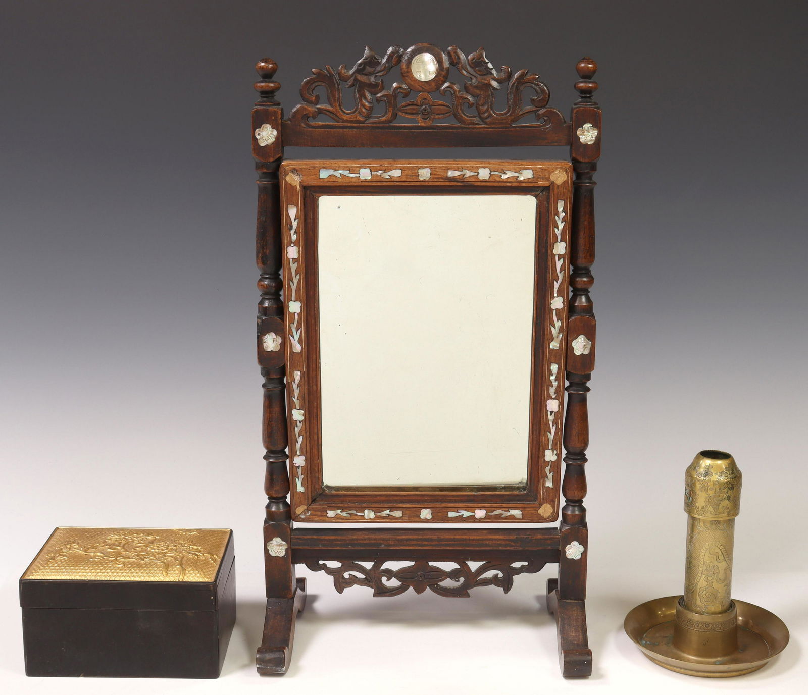 3) CHINESE TABLE ITEMS, CHEVAL MIRROR, CANDLESTICK: (lot of 3) Chinese table items, including: (1) carved wood and mother of pearl cheval table mirror, pierced dragon crest, inlaid frame encasing flat mirror plate, on bridge feet, approx 18"h, 9.75"w,