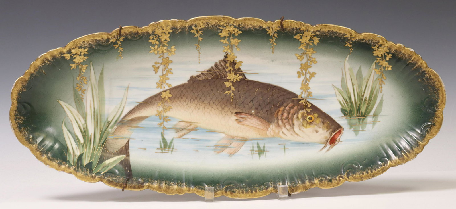 FRENCH LIMOGES HAND-PAINTED PORCELAIN FISH PLATTER: French Limoges porcelain fish platter, hand-painted marine design, with parcel gilt accents, approx 24"l, 10"w, 5lbs Start Price: $80.00
