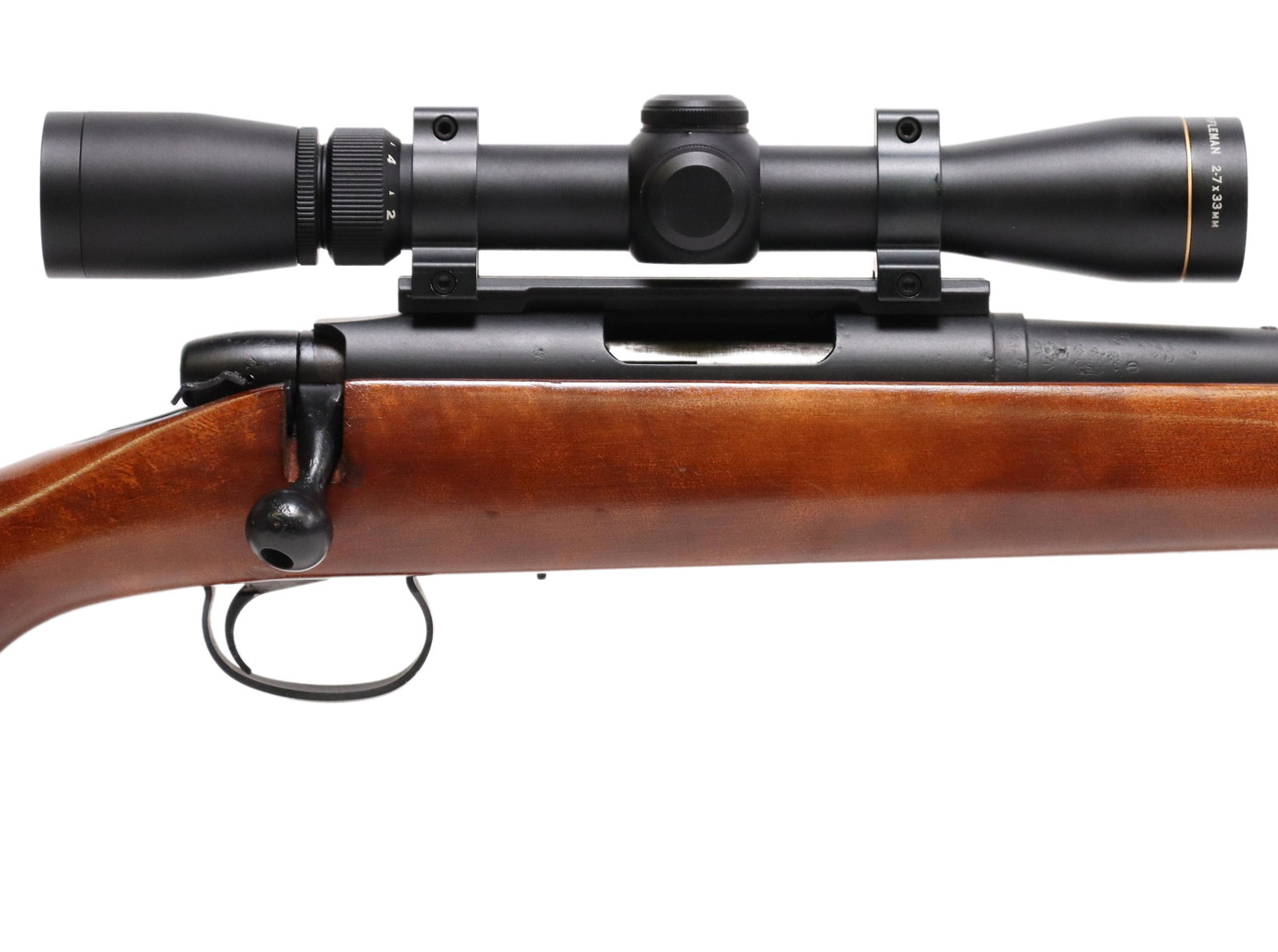 REMINGTON MODEL 788 RIFLE, LEUPOLD SCOPE, .223 CAL: Remington Model 788 rifle, bolt action, .223 Rem. caliber, 24" barrel, mounted Leupold 2 x 7 variable scope, hardwood stock, action good, bright bore with good rifling, metal good, light scratching to