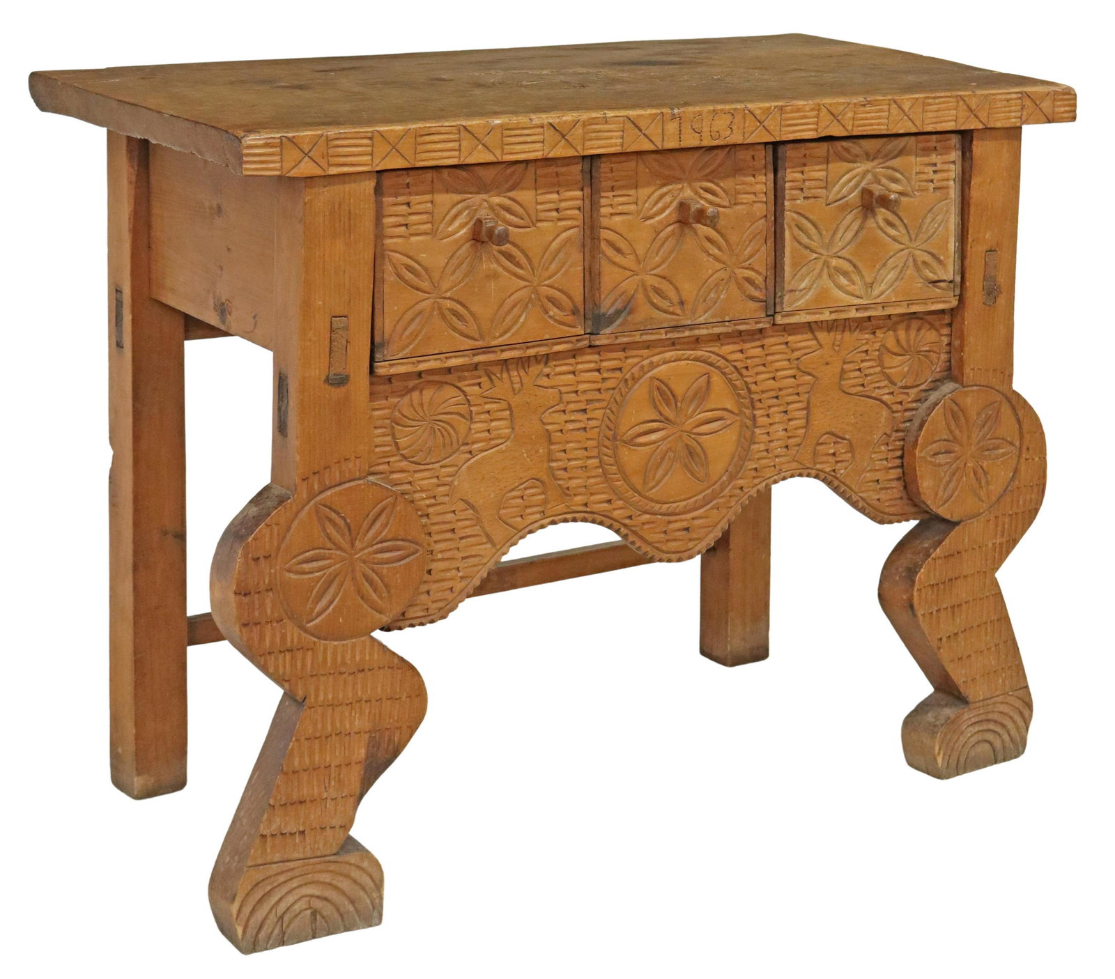 GUATEMALAN NAHUALA CARVED WOOD CONSOLE TABLE: Carved wood console table, Nahuala, Guatemala, having rectangular top, over three drawers, above serpentine apron, carved deer and incised geometric motifs, dated 1963 at top trim, rising on shaped le