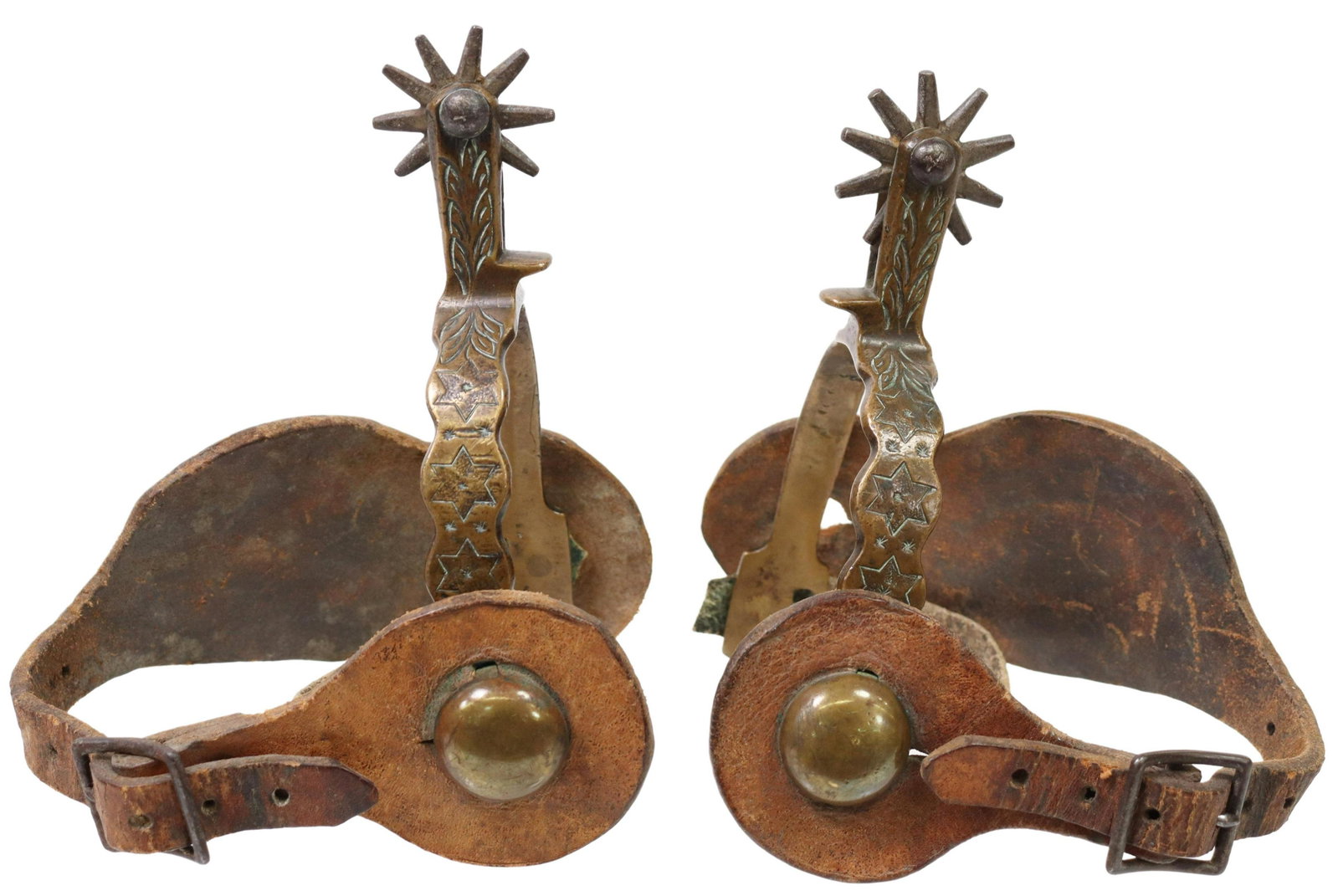 WESTERN ENGRAVED BRONZE COWBOY SPURS: (pair) Western bronze spurs, outside heelband with engraved stars, 1.5" steel rowels, ten points, worn leather straps, yoke: approx 3.25"w, 3.5"d; 1lbs total Start Price: $100.00