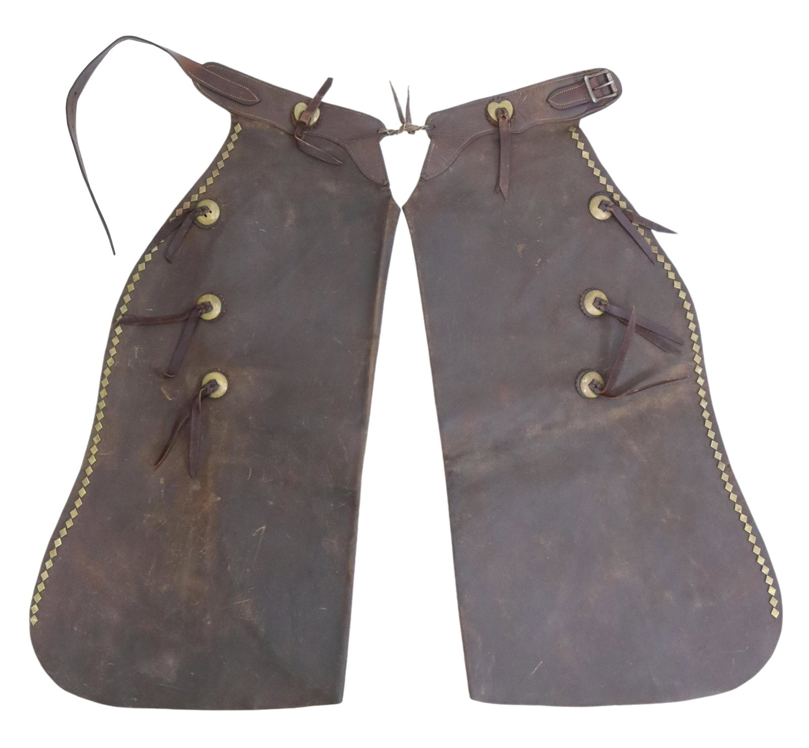 (PAIR) VINTAGE COWBOY CHAPS HEART & DIAMOND CONCHO: (pair) Vintage cowboy brown leather chaps, two heart form conchos at belt, three circular conchos at each leg, metal diamond form metal accents at the length of each leg, no maker mark, approx. 36.25"