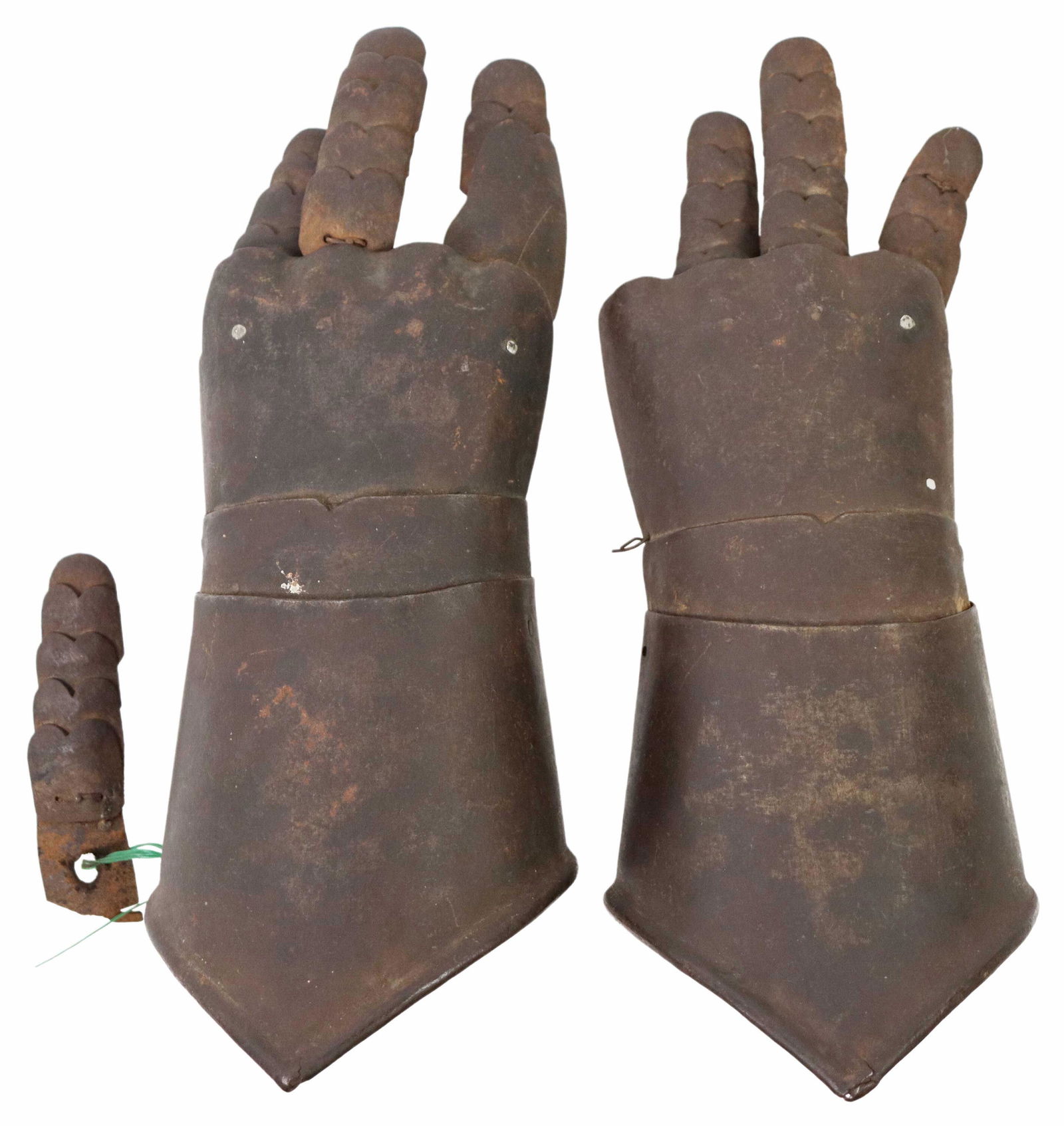 (PAIR) ARMOR GAUNTLETS, 17TH C.: (pair) Armor gauntlets, unknown era but believed to be 17th c., light steel construction with riveted joinery, retaining some leather under fingers, one gauntlet lacking one finger, the other with fin