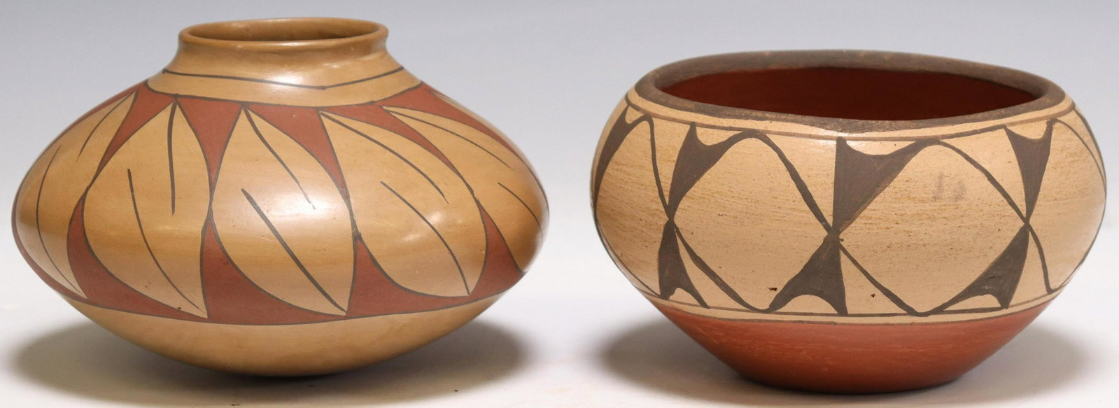 (2) NATIVE AMERICAN POTTERY, ONE KATHY PINO, ZIA: (lot of 2) Native American pottery: (1) pot signed Kathy Pino, Zia (Katherine Pino, Zia Pueblo, New Mexico, 1935-2017), approx. 3.75"h, 6.5" diam; (1) pot, unsigned, approx. 4.25"h, 6.25" diam, total 