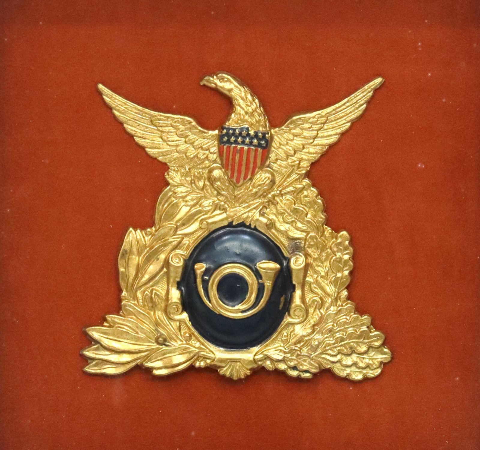 US CIVIL WAR EAGLE, SHIELD & BUGLE SHAKO INSIGNIA: Framed U.S.. Civil War era shako insignia, brass with an eagle, the Federal shield and a center bugle emblem of the infantry, uniforms and shako hats with this shield ordered in 1861 by the U.S. War, 
