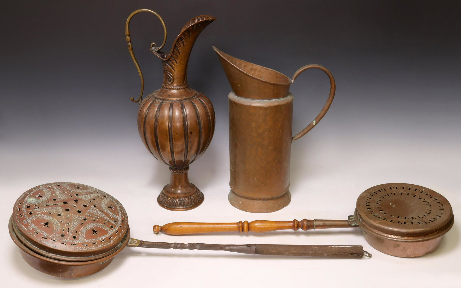 (4) FRENCH COPPER EWERS & BED WARMING PANS: (lot of 4) French copper and metal housewares, including: (2) handled ewers, each with pinched rim for pouring, (one) with gadrooned body, rising on circular foot, largest: approx 24"h, 9"diam; (2) be