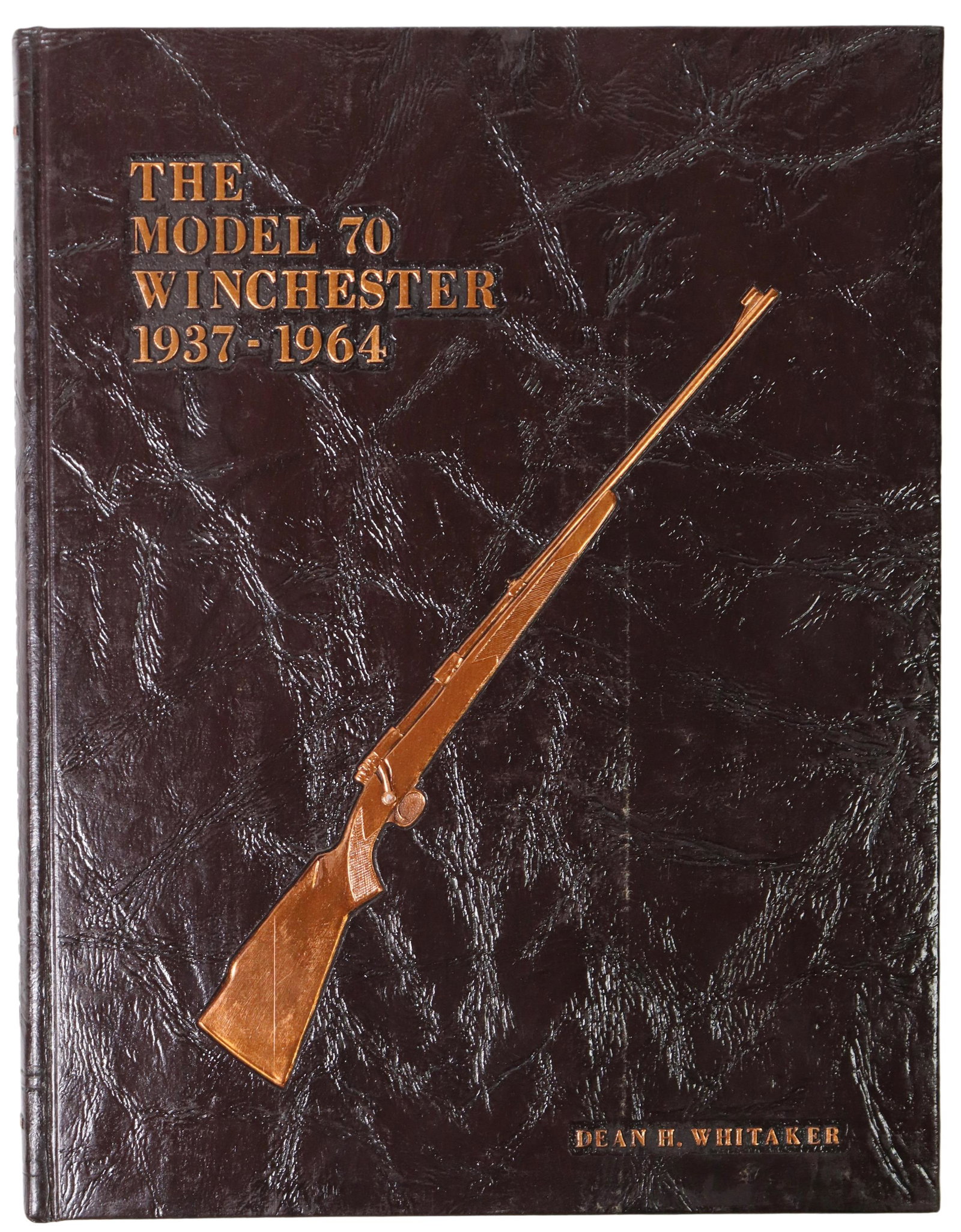 BOOK: MODEL 70 WINCHESTER 1937-1964, DEAN WHITAKER: Book: "The Model 70 Winchester: 1937-1964," Dean H. Whitaker, Taylor Publishing Company, Dallas, Texas, 1978, 210 pages, approx 11.25"h, 8 7/8"w, 2.25lbs **Provenance: A prominent Dallas, Texas estate
