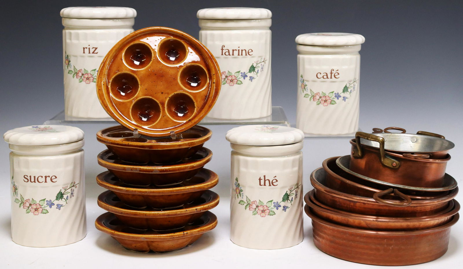 (19) ESCARGOT PLATES, CANISTERS & COPPER PANS: (lot of 19) Decorative housewares, including: (6) faience escargot plates, approx 7"w, (5) kitchen canisters, Mindel presents Spring Fields by Jenny Rhodes, largest: approx 7"h, 4.75"diam, (8) copper