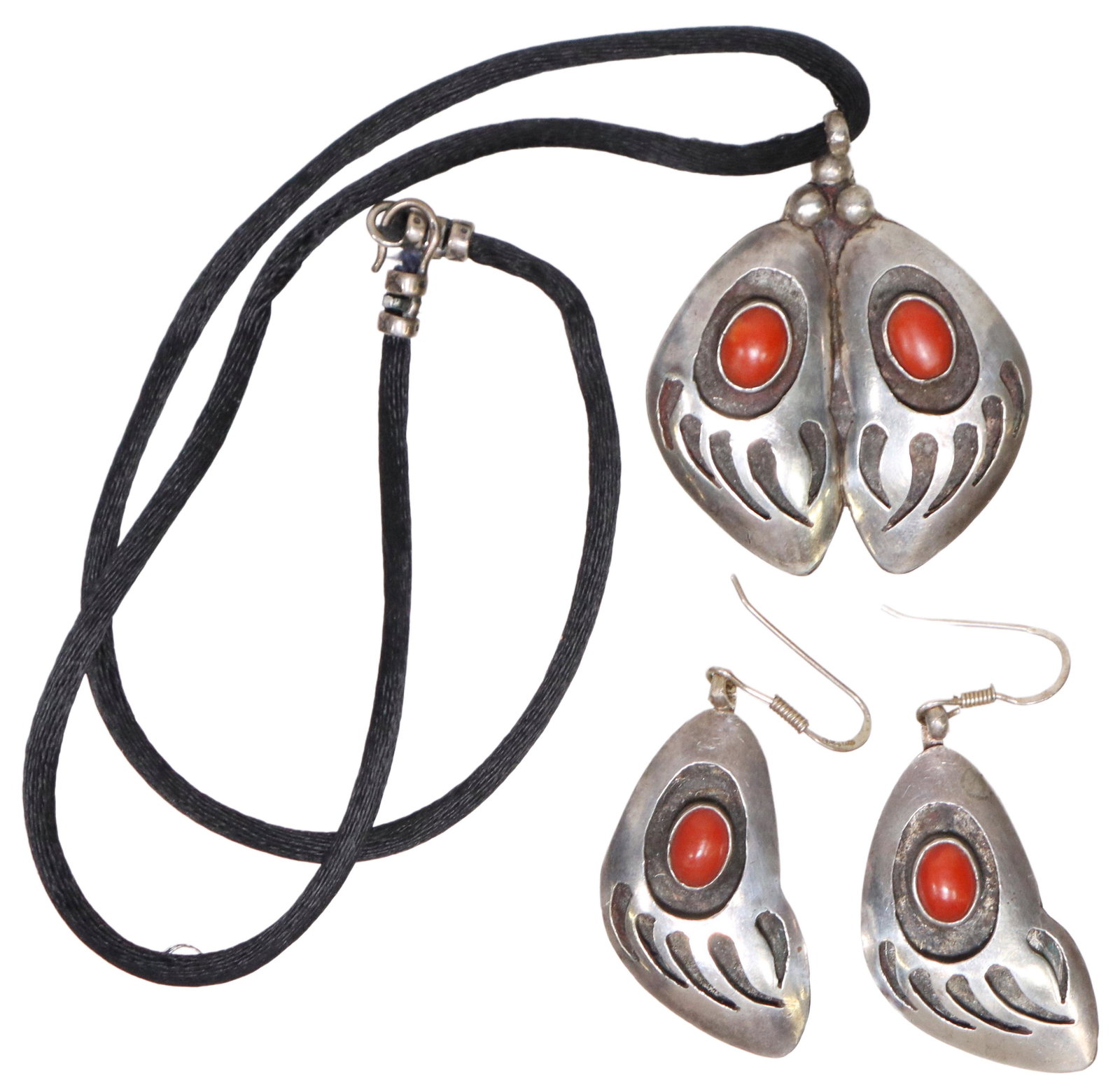 (2) SOUTHWEST SILVER OVERLAY NECKLACE & EARRINGS: (lot of 2) Southwest silver (content unknown) overlay jewelry, pendant signed Mae. G, bear paw motif with red cabochons, including: (1) pendant necklace, pendant: approx 1.75"l, 1.5"w, necklace: appro