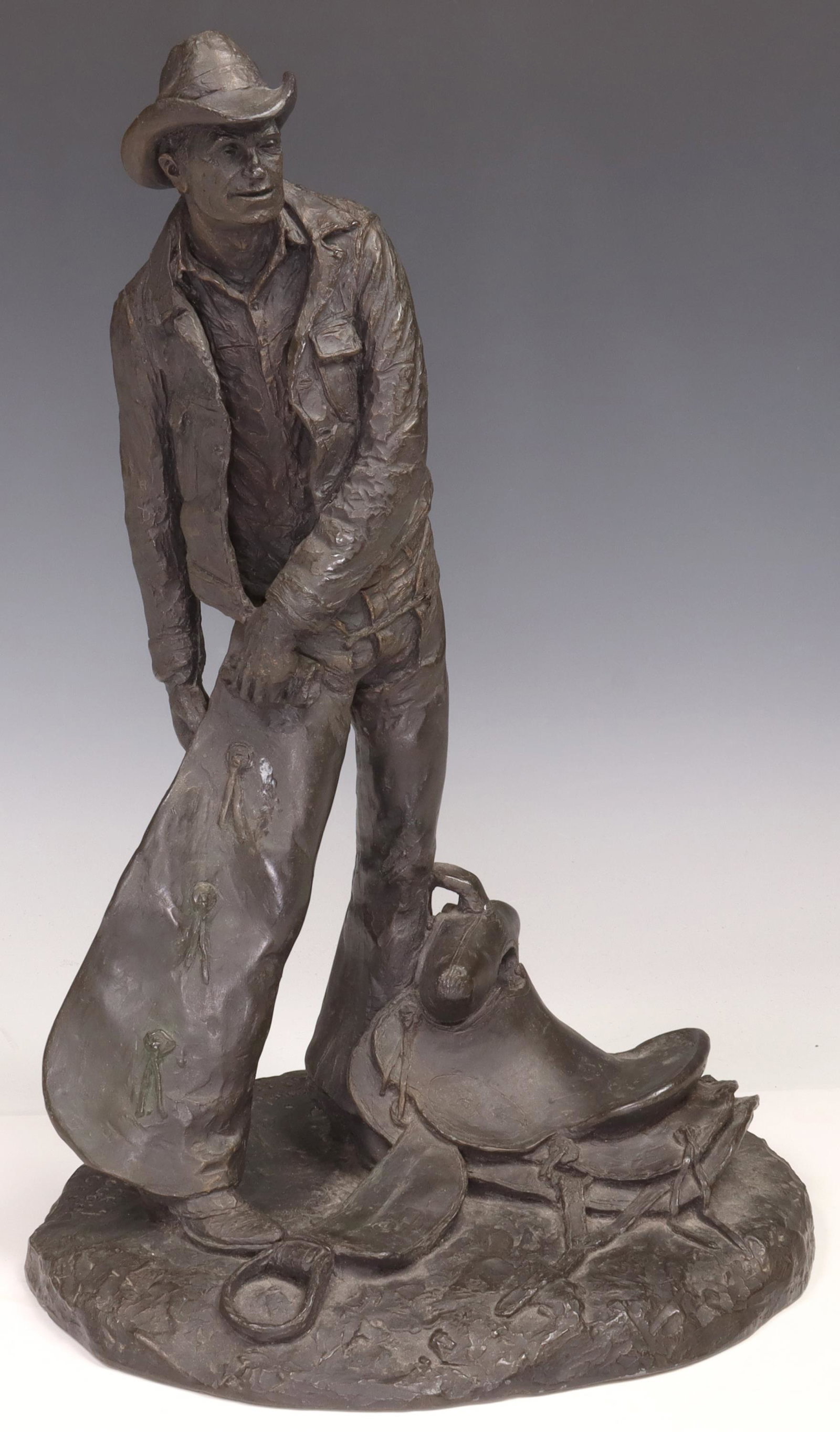 MICHAEL C. GARMAN (TX, D.2021) WESTERN SCULPTURE: Western cast composite sculpture, "Taking the Rough Off," signed in cast after Michael C. Garman (Michael Charles Garman, Texas/ American, 1938-2021), copyright 1972, approx 16"h, 11"w, 9"d, 8.5lbs St