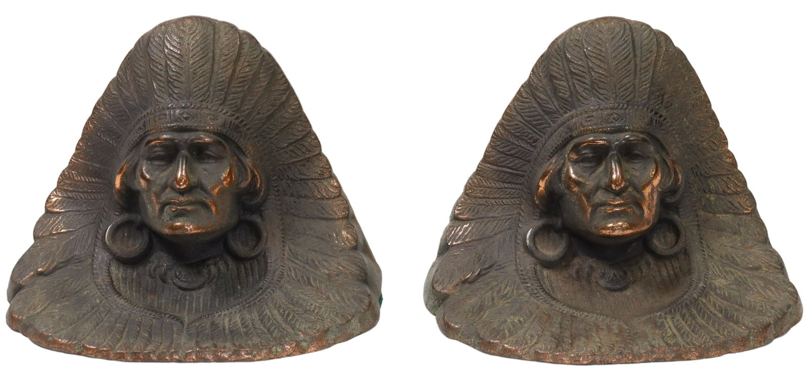 (PAIR) INDIAN CHIEF CAST IRON BOOKENDS, c.1925: (pair) Cast iron bookends depicting an Indian Chief with elaborate headdress, bronze patina, mfg. c.1925 by H.L. Judd Company, Conn., approx 5.25"h, 7"w, 3.5"d, 10lbs **Provenance: A prominent Dallas,