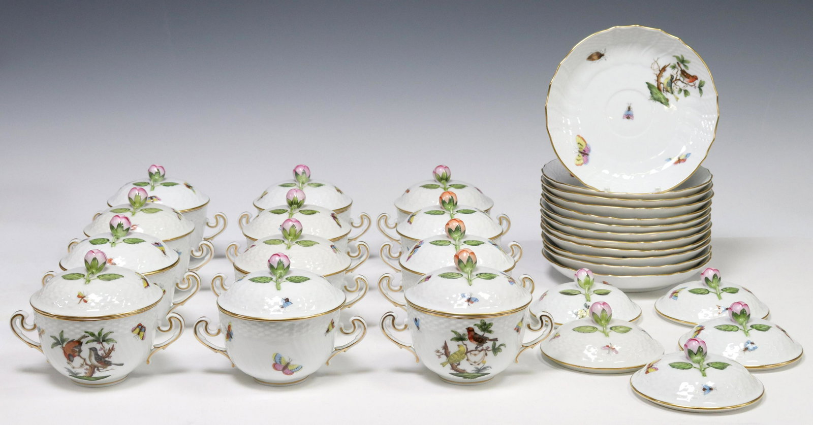 (29) HEREND 'ROTHSCHILD BIRD' SOUP BOWLS & SAUCERS: (lot of 29) Hungarian porcelain tableware, Herend, 20th c., in the "Rothschild Bird" pattern, having parcel gilt trim, various hand-painted bird and insect motifs, each with maker's mark underfoot, in