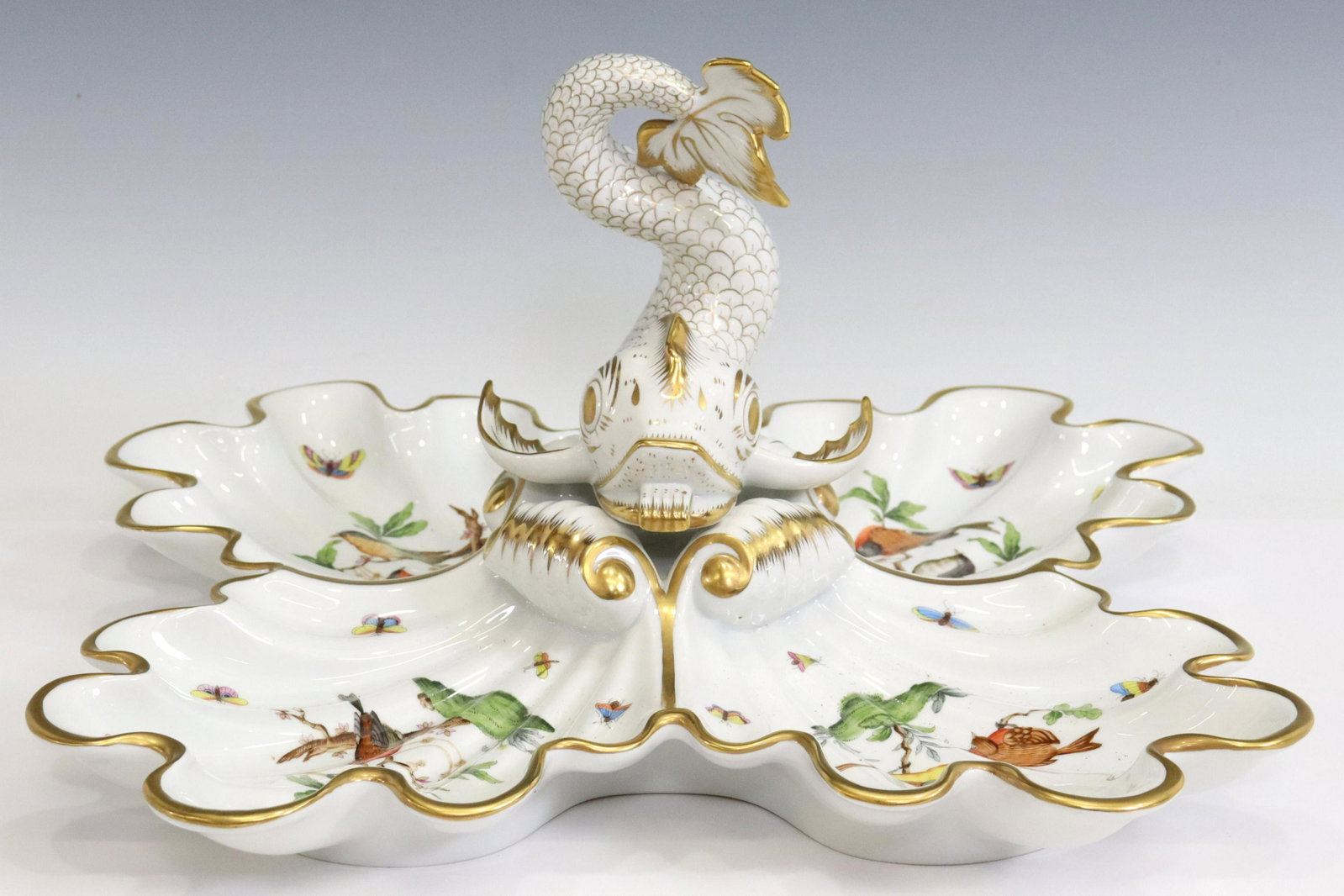 HEREND 'ROTHSCHILD BIRD' PORCELAIN CENTERPIECE: Hungarian porcelain sectioned centerpiece dish, Herend, 20th c., in the "Rothschild Bird" pattern, having parcel gilt trim, scalloped edges, various hand-painted bird and insect motifs, with central d