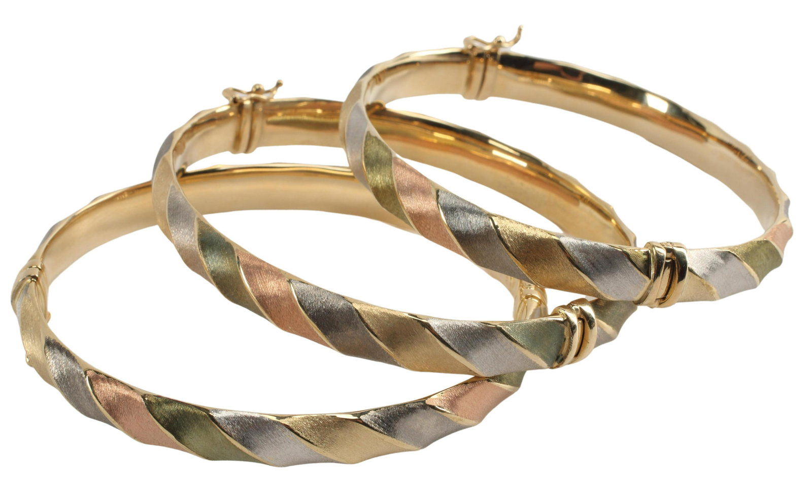 (3) ITALIAN 14KT TRI-COLOR GOLD HOLLOW BANGLES: (lot of 3) Estate Italian 14kt brushed tri-color gold hollow bangles, Milor, each with safety catch, marked 14k, Milor, Italy to interior, interior: approx 2.25"w, 20.3 grams total (inclusive of all m