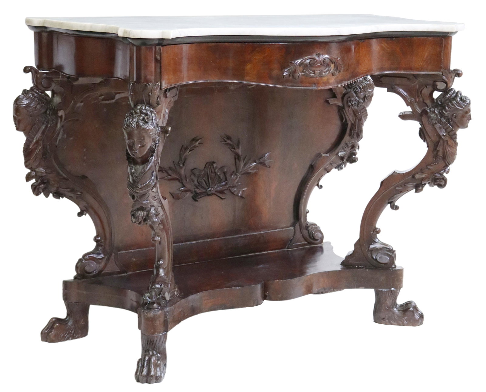 ITALIAN RENAISSANCE REVIVAL MARBLE-TOP CONSOLE: Italian Renaissance Revival carved console table, 19th c., having shaped marble top, over serpentine front, carved caryatid supports, medial shelf stretcher, ending on paw feet, with some restorations