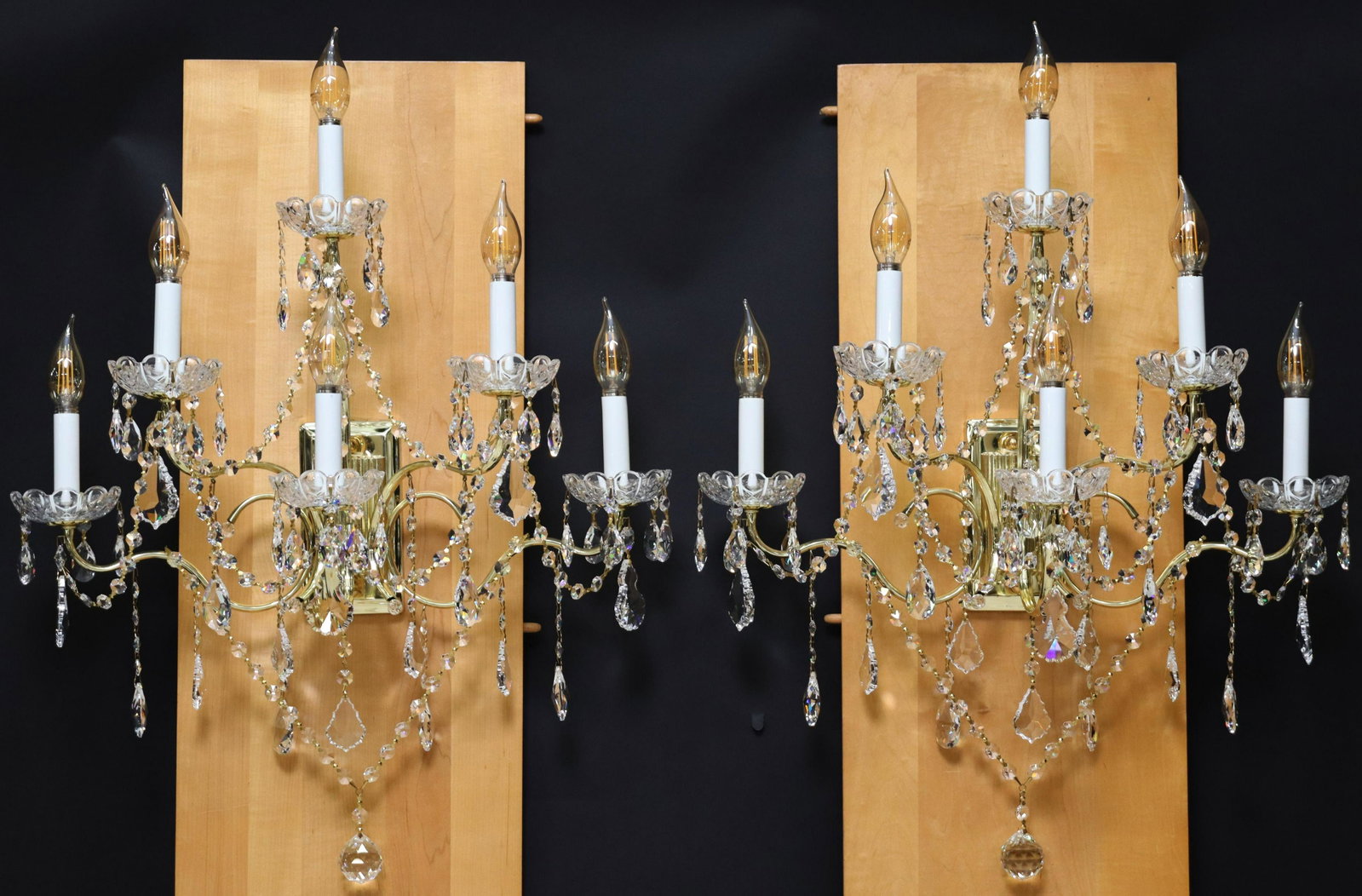 (2) SCHONBEK CRYSTAL SIX-LIGHT WALL SCONCES: (pair) Schonbek six-light sconces, 20th c., polished gold-tone metal frame, glass bobeche, faceted crystal beads and prisms, in need of wiring, approx 26"h, 23"w Start Price: $300.00