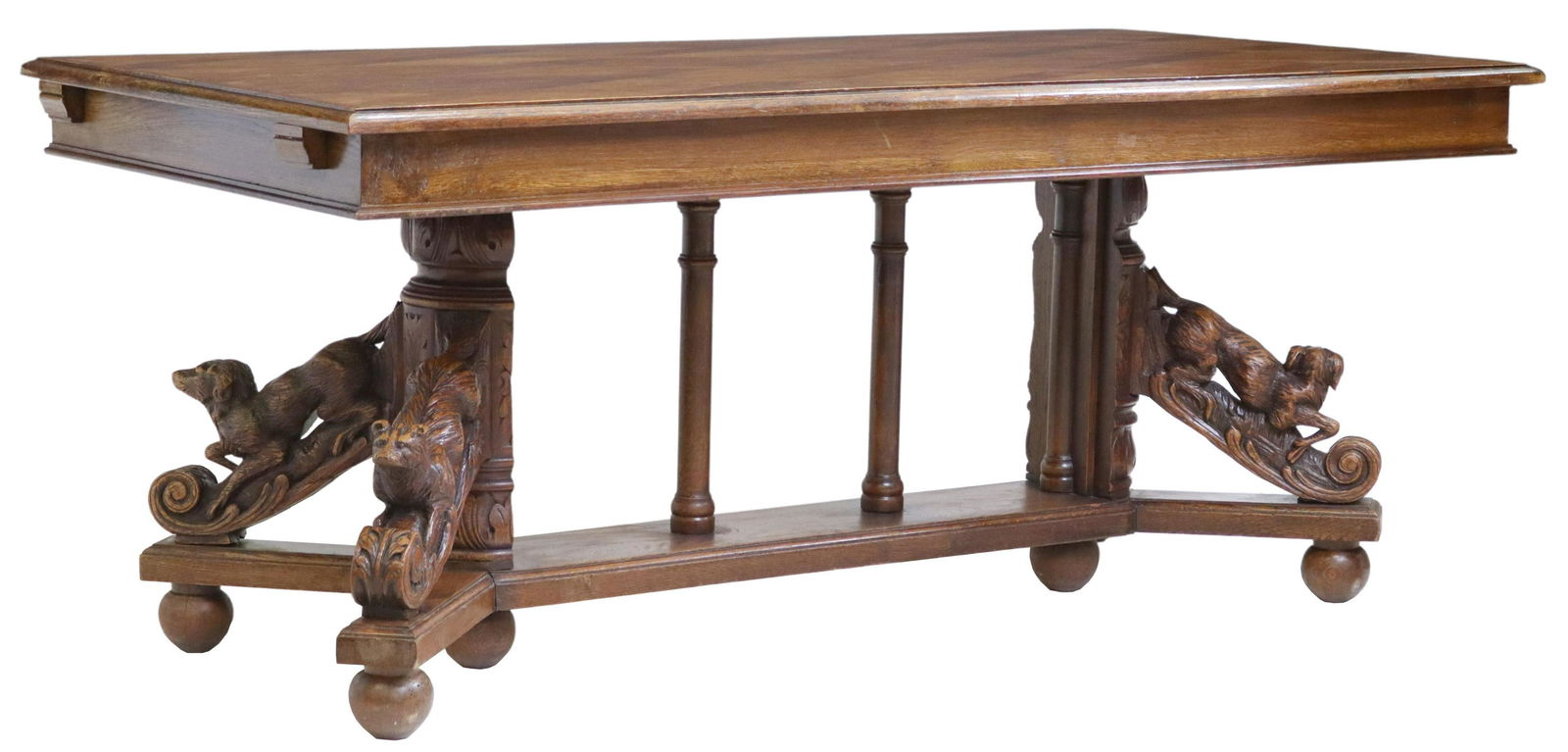 FRENCH CARVED OAK HUNT MOTIF DINING TABLE: French oak dining table, late 19th/ early 20th c., diamond parquetry tabletop, carved supports modeled as hunting dogs, stag, and fox, joined by colonnaded cross stretcher, some small losses to carvin