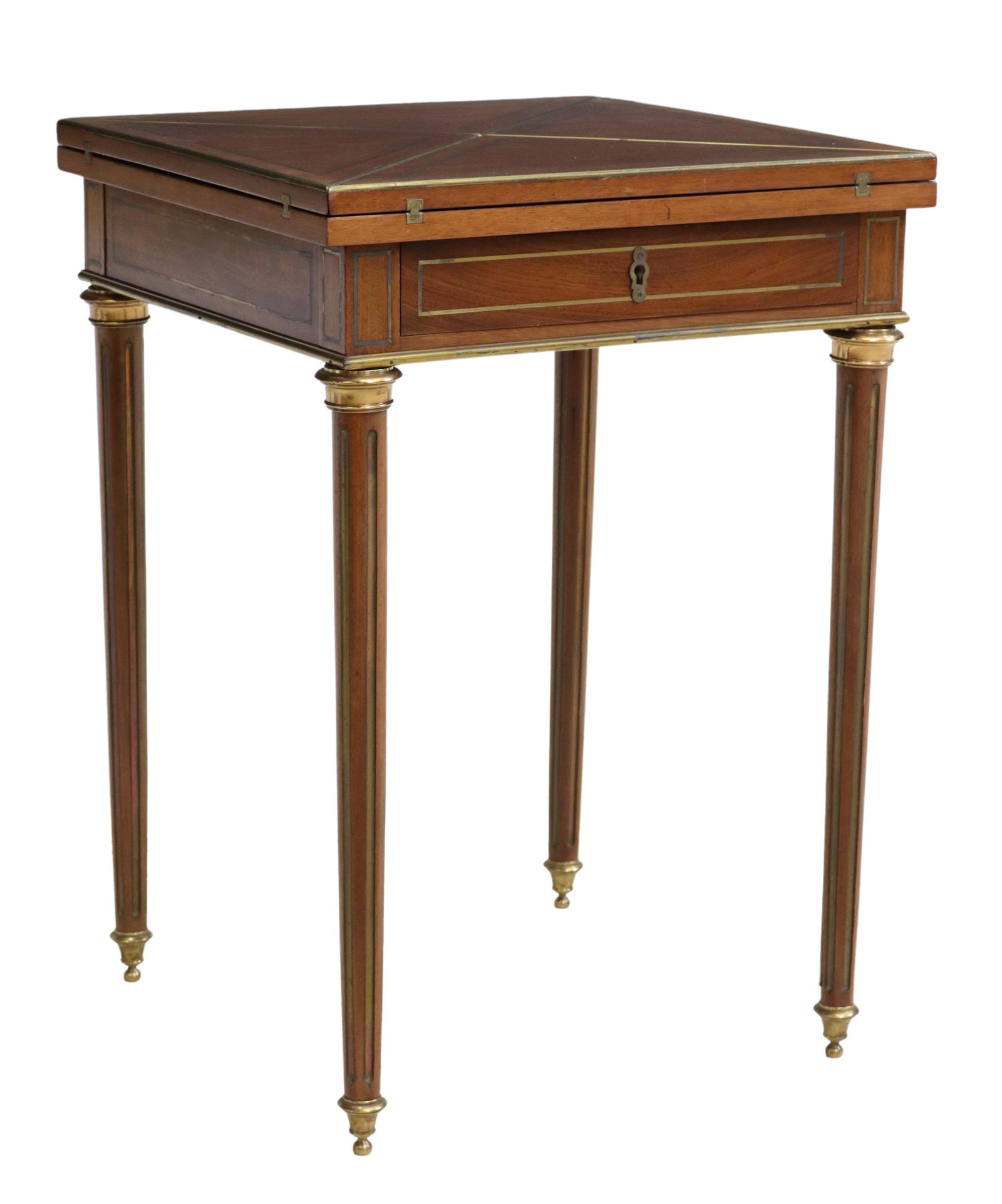 LOUIS XVI STYLE MAHOGANY ENVELOPE GAMES TABLE: Louis XVI style mahogany envelope games table, 20th c., having rotating square top, with brass string inlay, envelope-folding leaves open to reveal green felt playing surface and chip wells, over sing