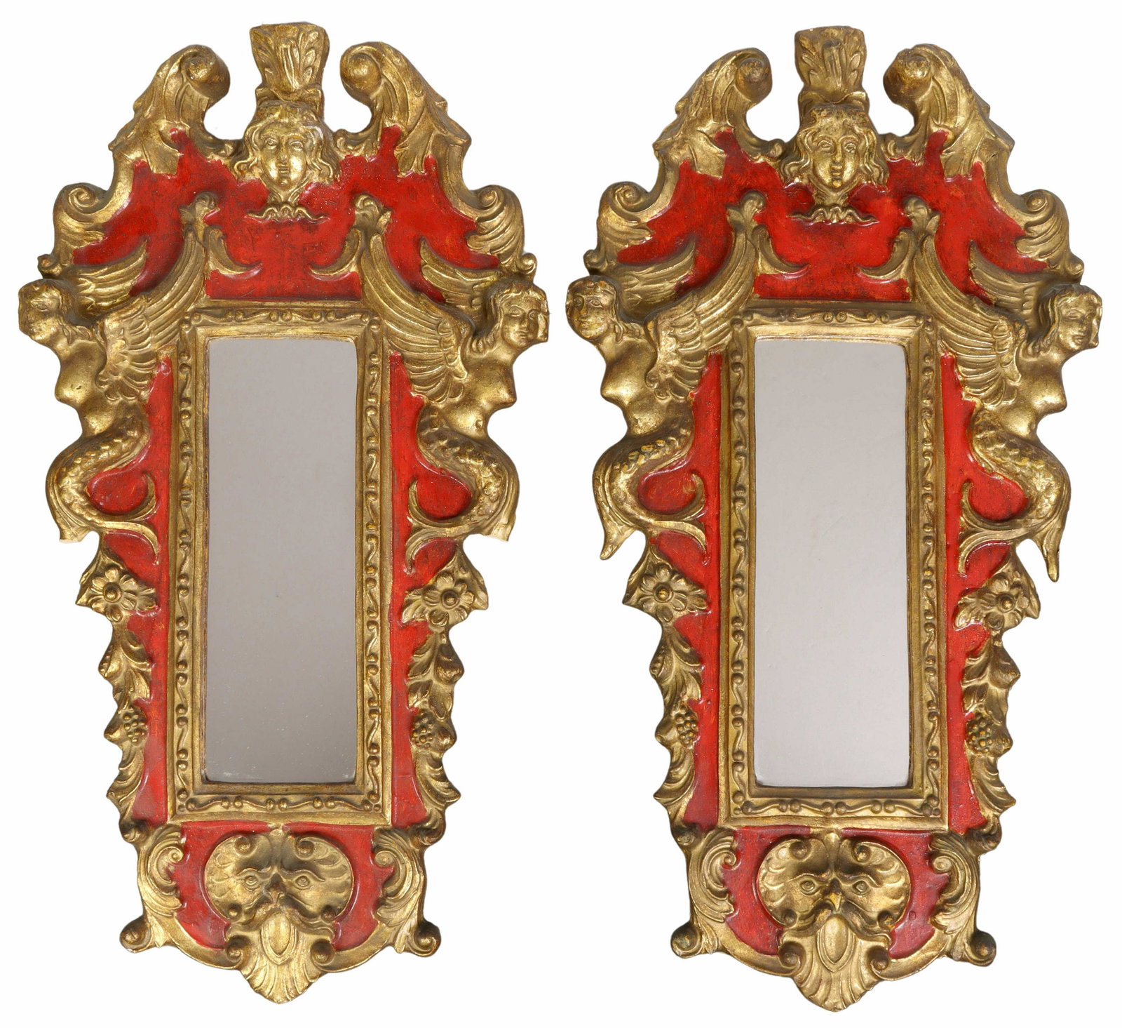 (2) ITALIAN PARCEL GILT ACCENT WALL MIRRORS: (pair) Italian figural parcel gilt accent wall mirrors, 20th c., having split pediment crest, centering figural mask, over winged Melusine, red ground centering flat mirror plate, all over grotesque m