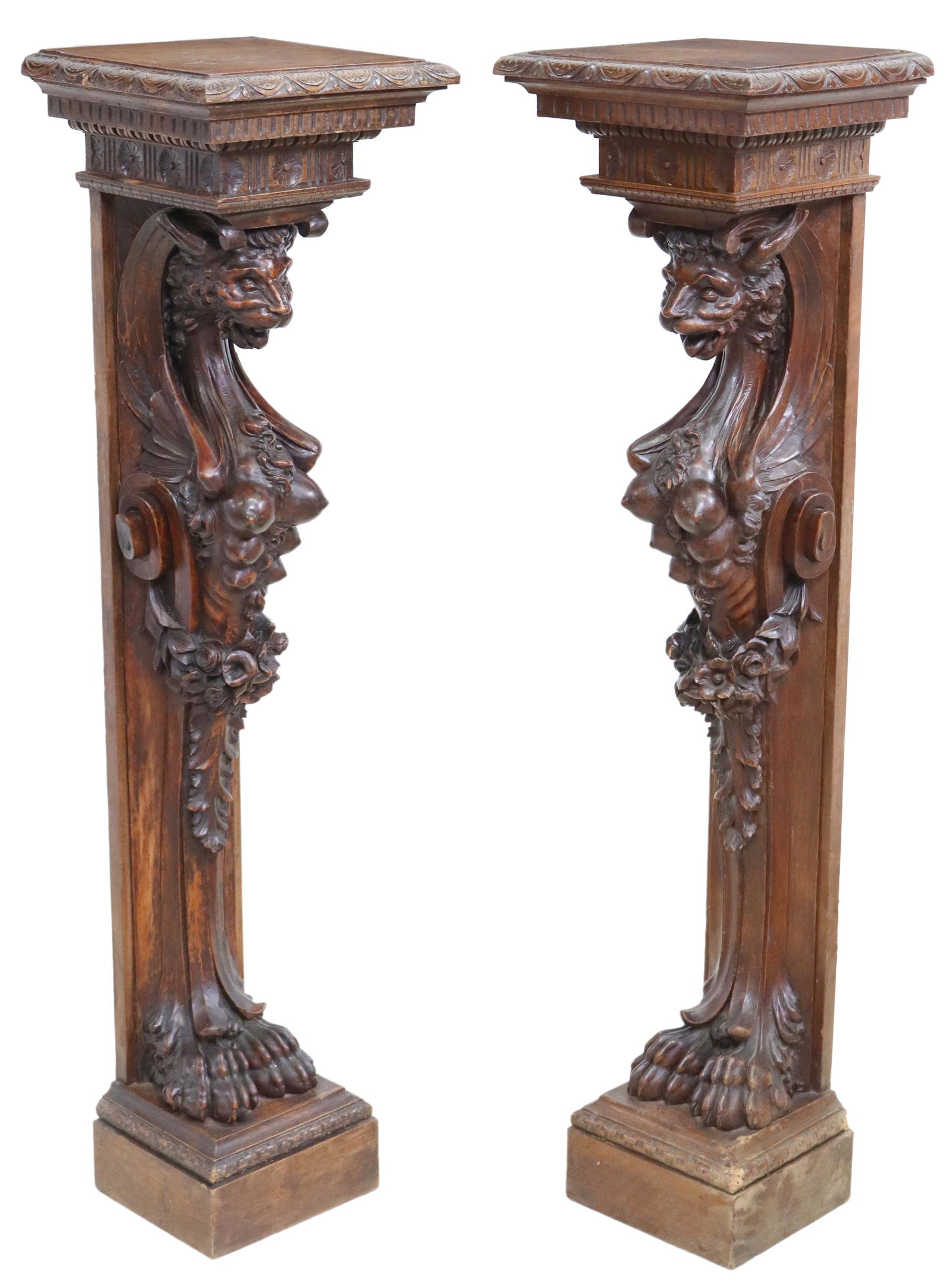 (2) RENAISSANCE REVIVAL ARCHITECTURAL PEDESTALS: (pair) Italian Renaissance Revival carved walnut architectural pedestals, 19th c., having top with lunette border, over carved mythical beast, on hairy paw feet, ending on integral plinth base, some w