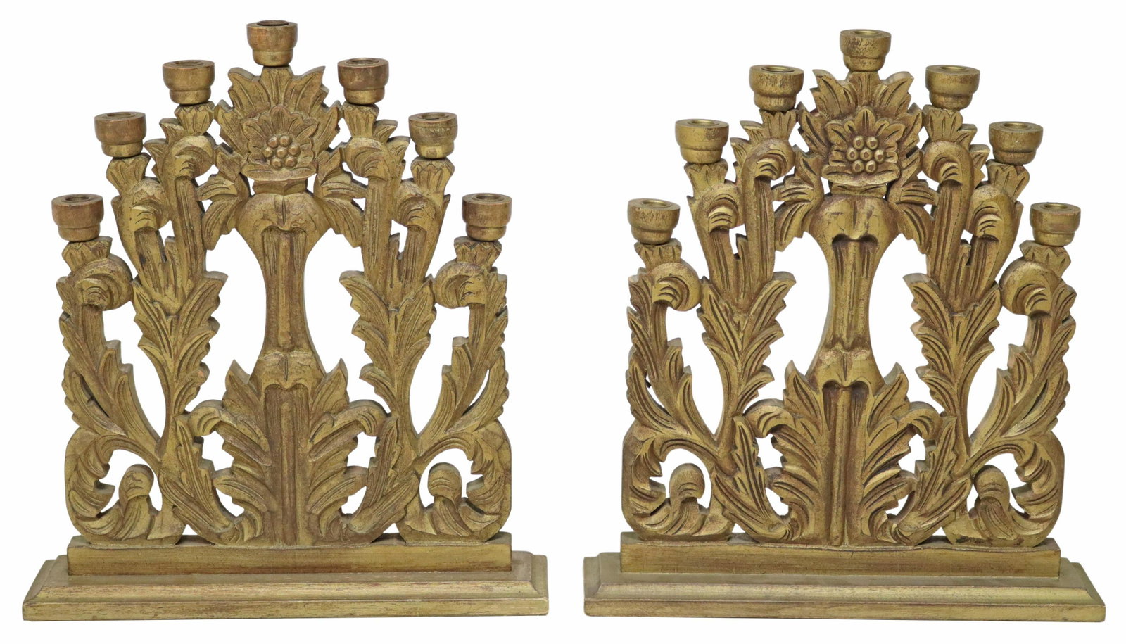 (2) CARVED & GILT PAINTED WOOD 7-LIGHT CANDELABRA: (pair) Continental carved and gilt painted wood candelabra, 20th c., seven candle cups, carved foliate scrolls, on a molded plinth base, approx 23.25"h, 20.5"w, 4.75"d; 18lbs total Start Price: $100.0