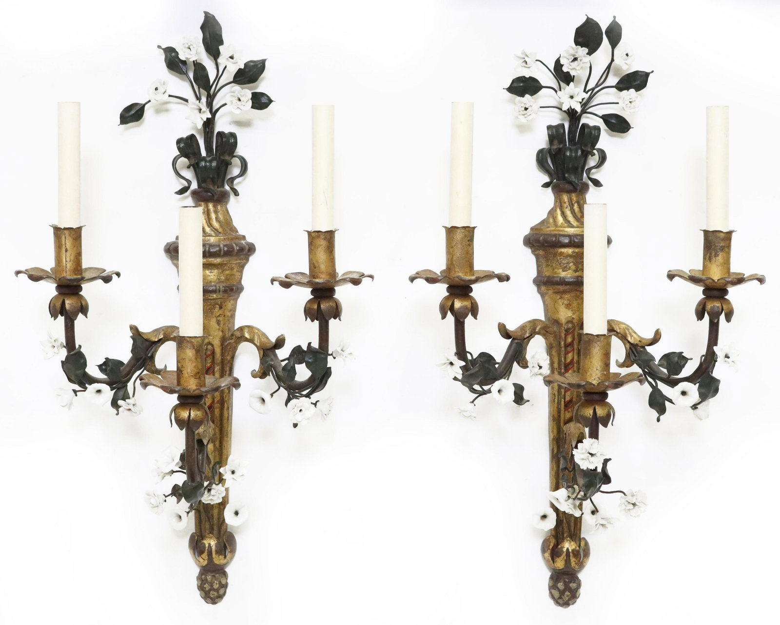 (2) PARCEL GILT & TOLE PAINTED THREE-LIGHT SCONCES: (pair) Parcel gilt and tole painted sconces, 20th c., three lights framed by applied porcelain flowers, approx 25"h, 14"w, 9.5"d **Provenance: An important San Antonio, Texas estate** Start Price: $15