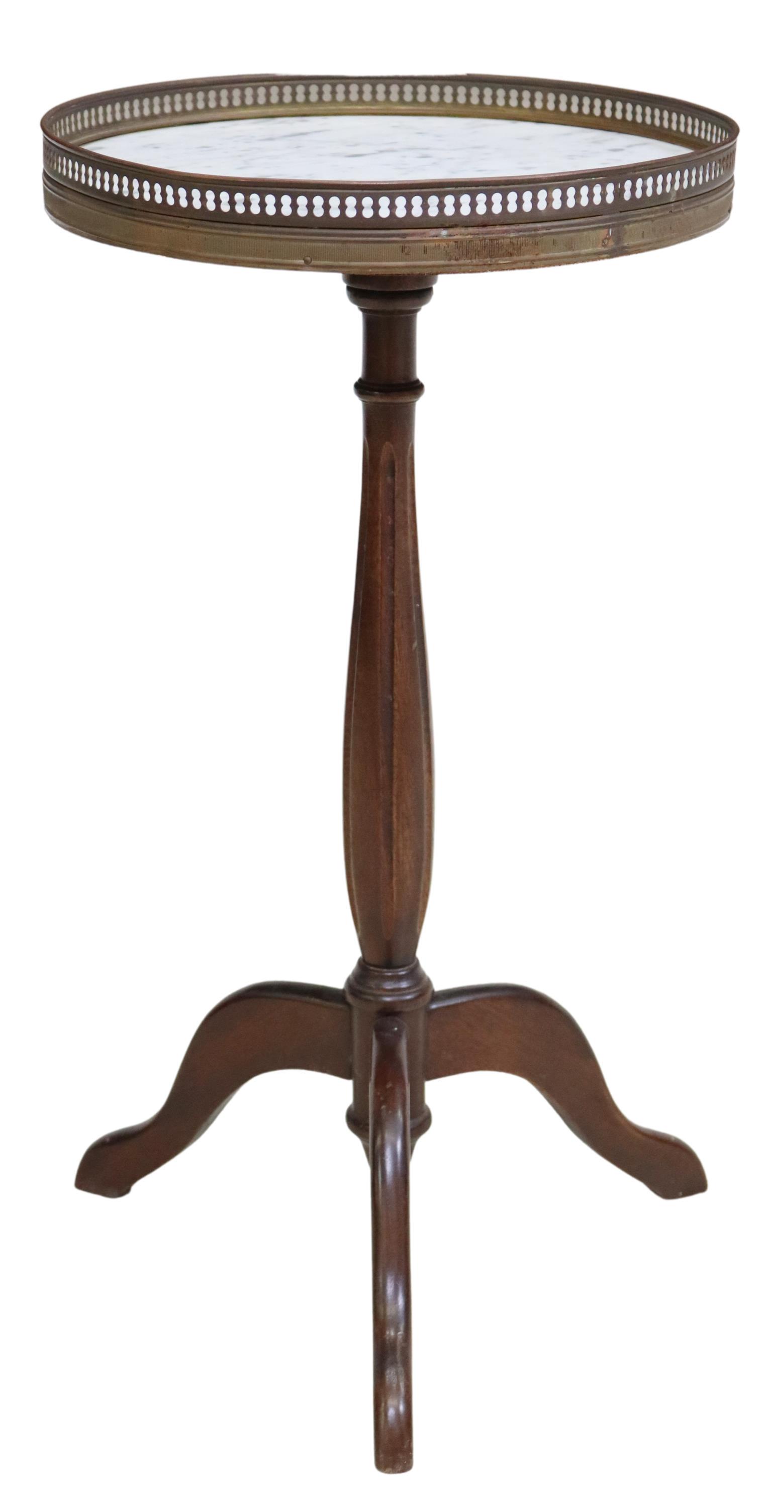 LOUIS XVI STYLE MARBLE-TOP MAHOGANY SIDE TABLE: French Louis XVI style mahogany stand/ side table, 20th c., having round marble-top with pierced gilt metal gallery, rising on fluted standard, ending on tripodal legs, approx 23.25"h, 13.5"diam Start