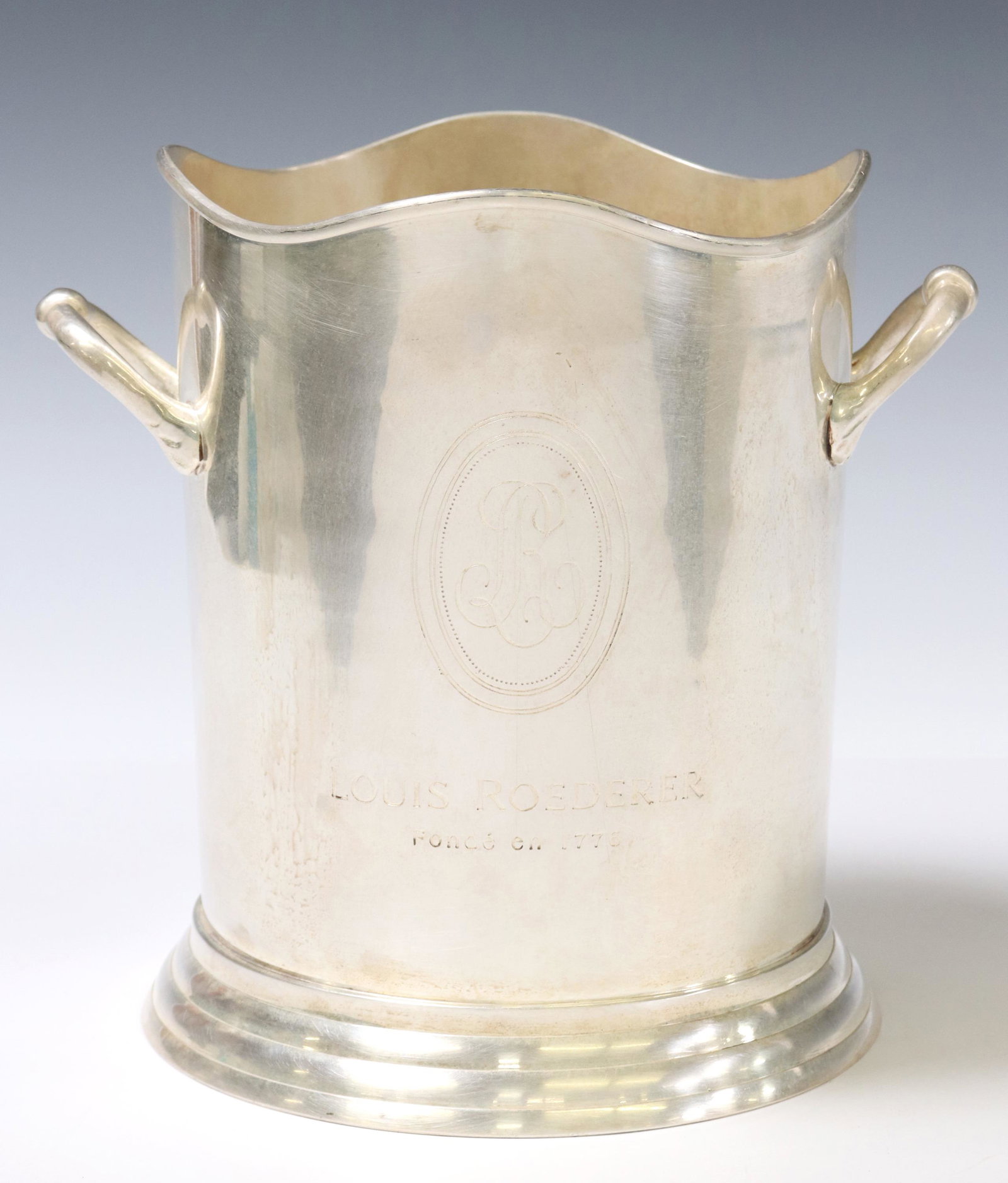 LOUIS ROEDERER CHAMPAGNE COOLER/ ICE BUCKET: Large silver-tone metal champagne cooler/ ice bucket, Louis Roederer, 20th c., approx 9.25"h, 8"diam, 3.5lbs Start Price: $40.00