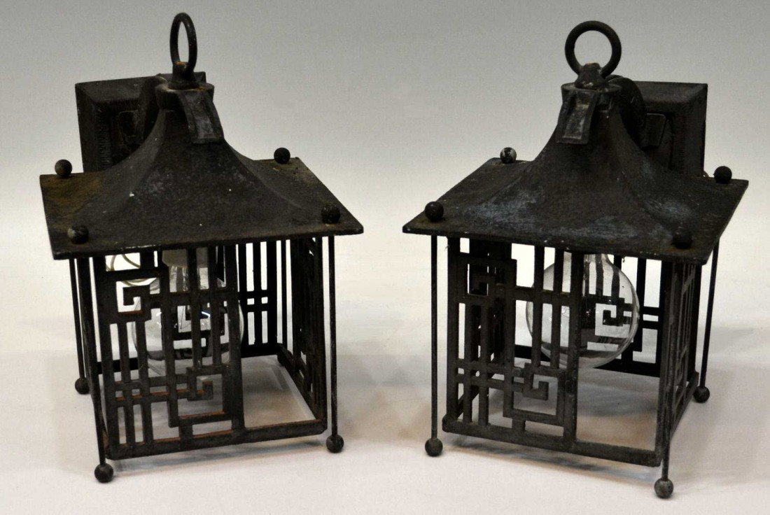 PAIR ASIAN STYLE WROUGHT IRON WALL LANTERN SCONCES: (set of 2) Wrought iron wall lantern, undertones of blue and red, wired, minor rust and loss of finish,10.5"h, 7.5"w, 10"d, 6lbs total Start Price: $80.00