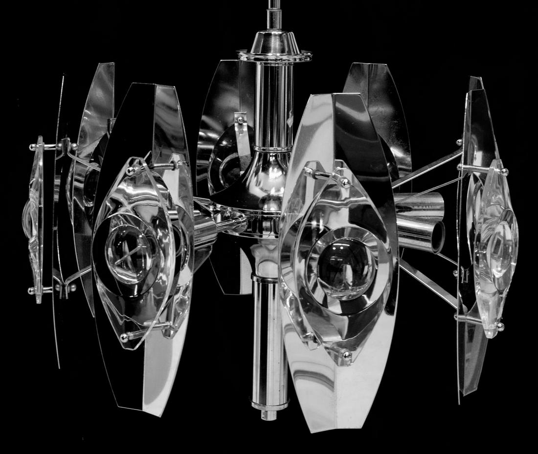 OSCAR TORLASCO (ATTRIB) CHROME & GLASS CHANDELIER: Italian mid-century modern glass and chromed steel eight-light chandelier, attributed to Oscar Torlasco (1934-2004), c.1960s, having eight arms issuing from the chromed steel body, each supporting sin