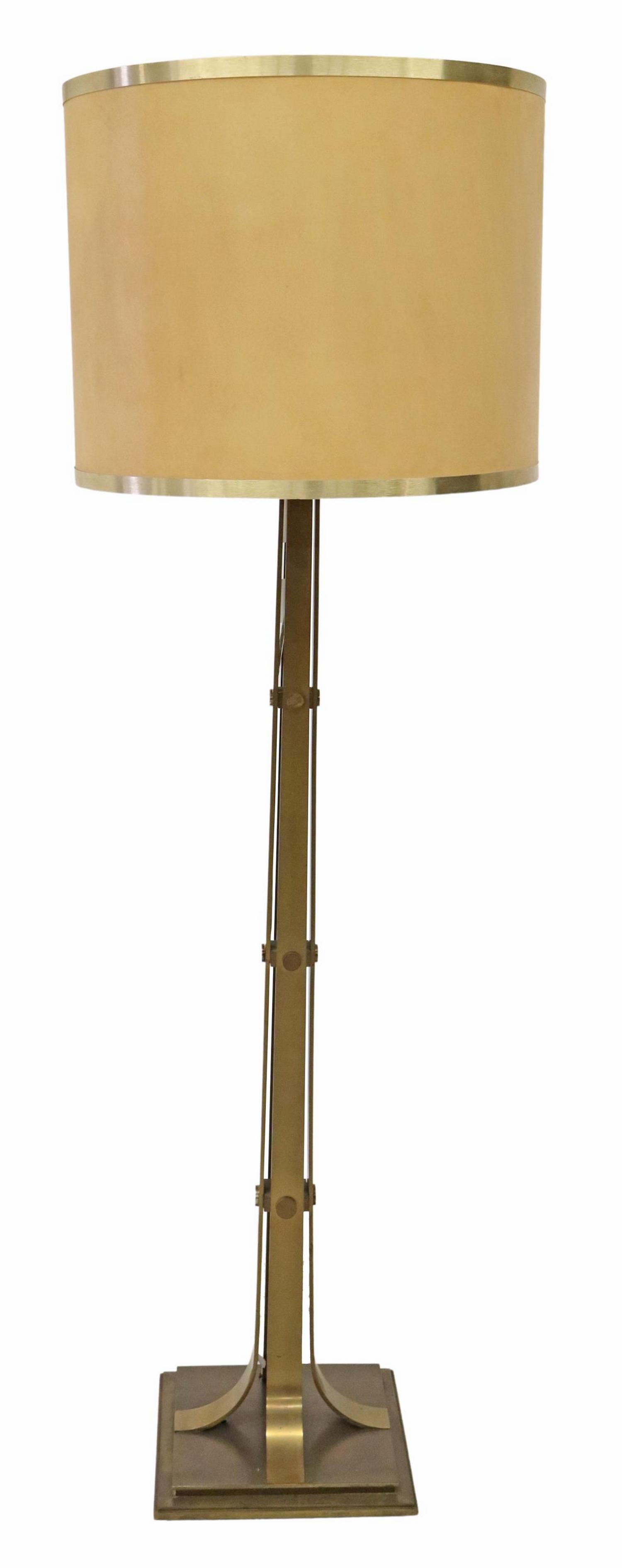 FRENCH ART DECO BRONZE TORCHIERE FLOOR LAMP: French Art Deco bronze three-light floor lamp, c.1940s, tapered paneled standard, terminating in curved supports, rising on stepped square base, electrified, approx 69.5"h, 13.25"sq**Provenance: An im