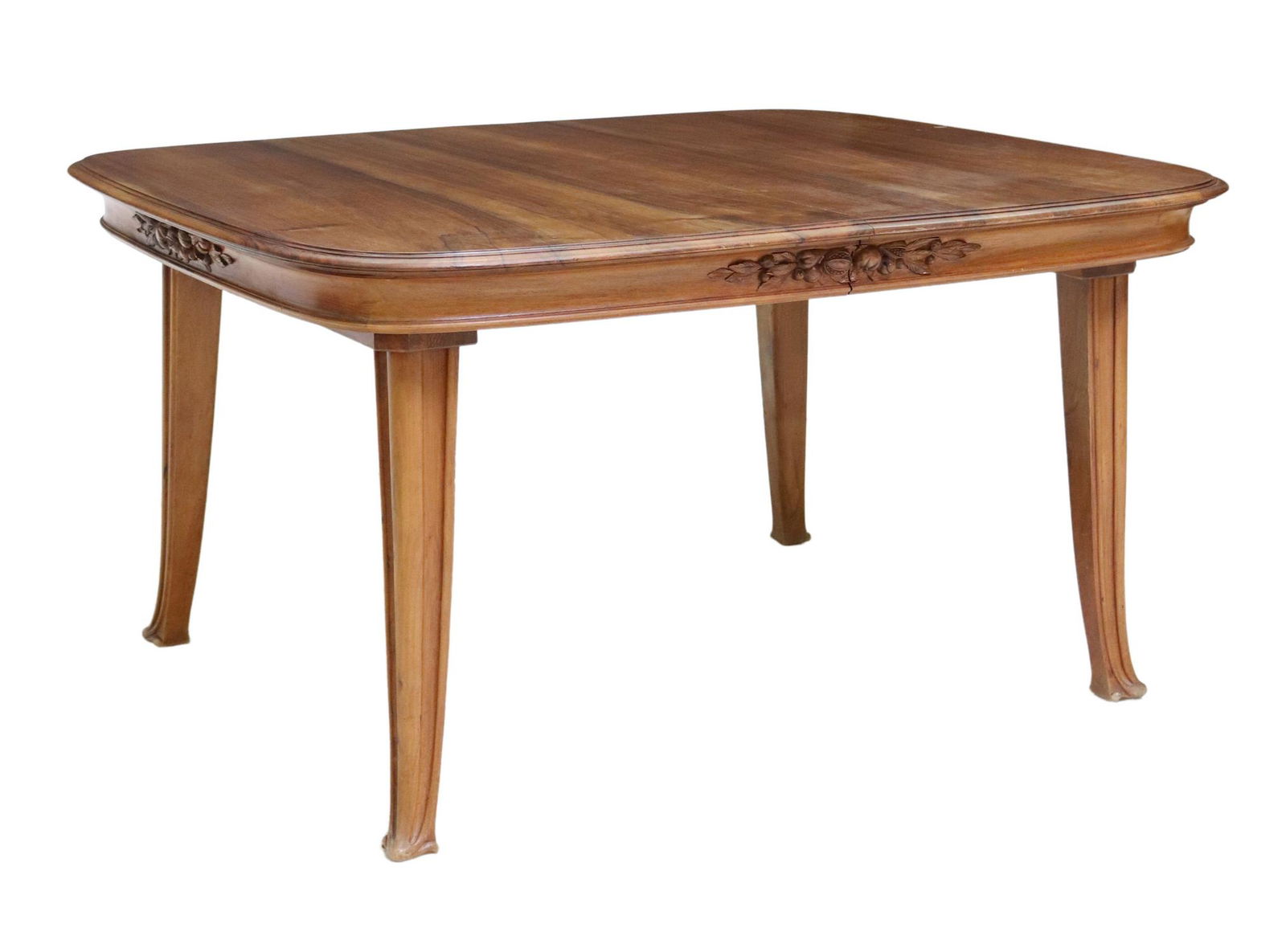 FRENCH ART NOUVEAU CARVED WALNUT DINING TABLE: French Art Nouveau walnut dining table, early 20th c., apron with carved fruit, rising on curved legs, no leaves present, small mar to one end of tabletop, approx 28.75"h, 54.75"l, 47"w, extended: app
