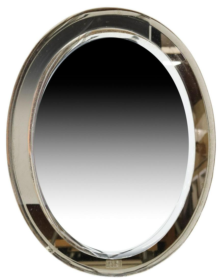 ITALIAN MODERN MURANO GLASS MIRROR: Italian modern Murano glass mirror, c.1970s, oval form, beveled mirror plate, on beveled smoke glass frame, approx 22 7/8"h, 29.75"w, 21lbs Start Price: $100.00